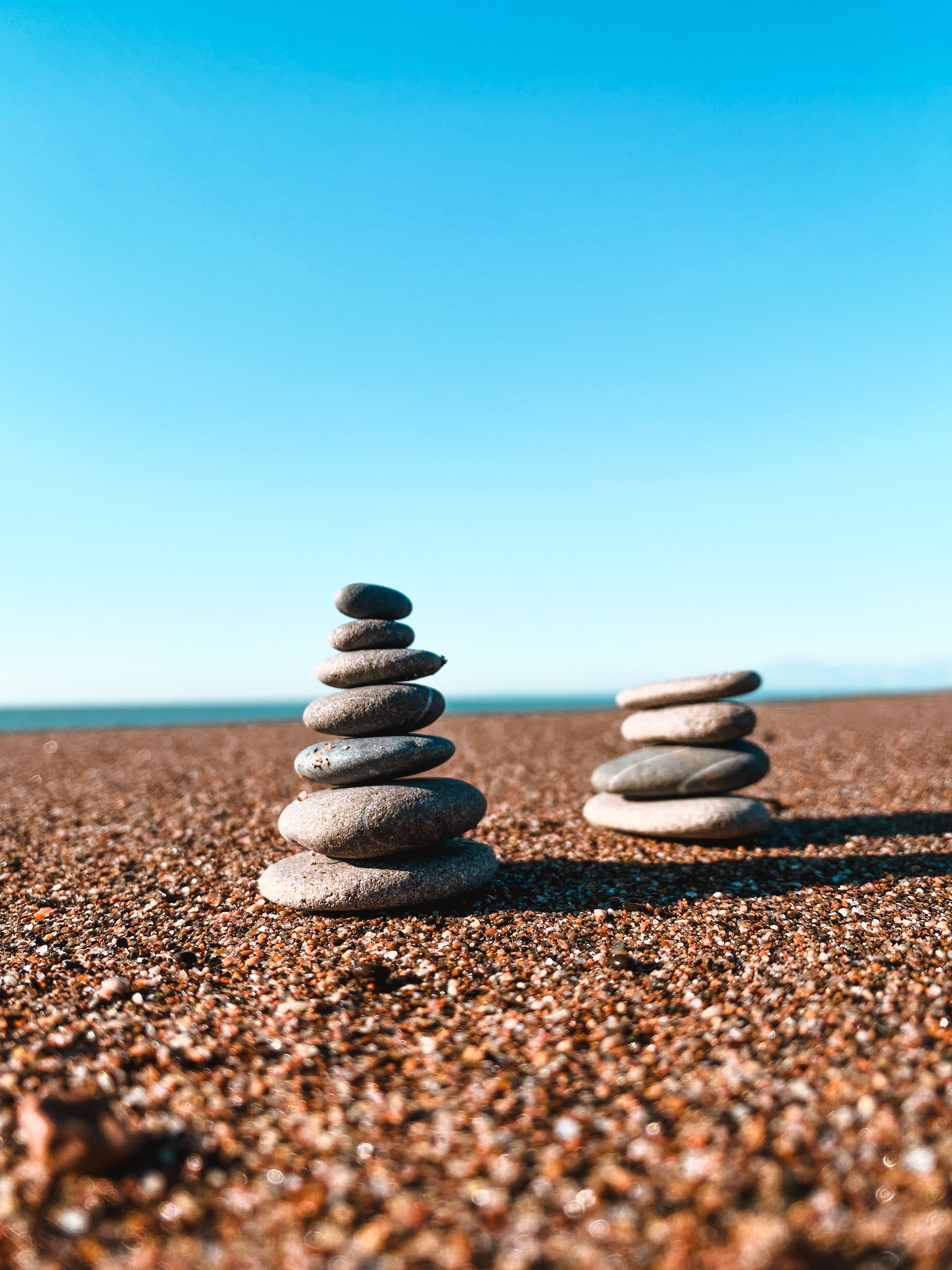 3024x4032 Balanced Stone Stacks on Sunny Beach · Free