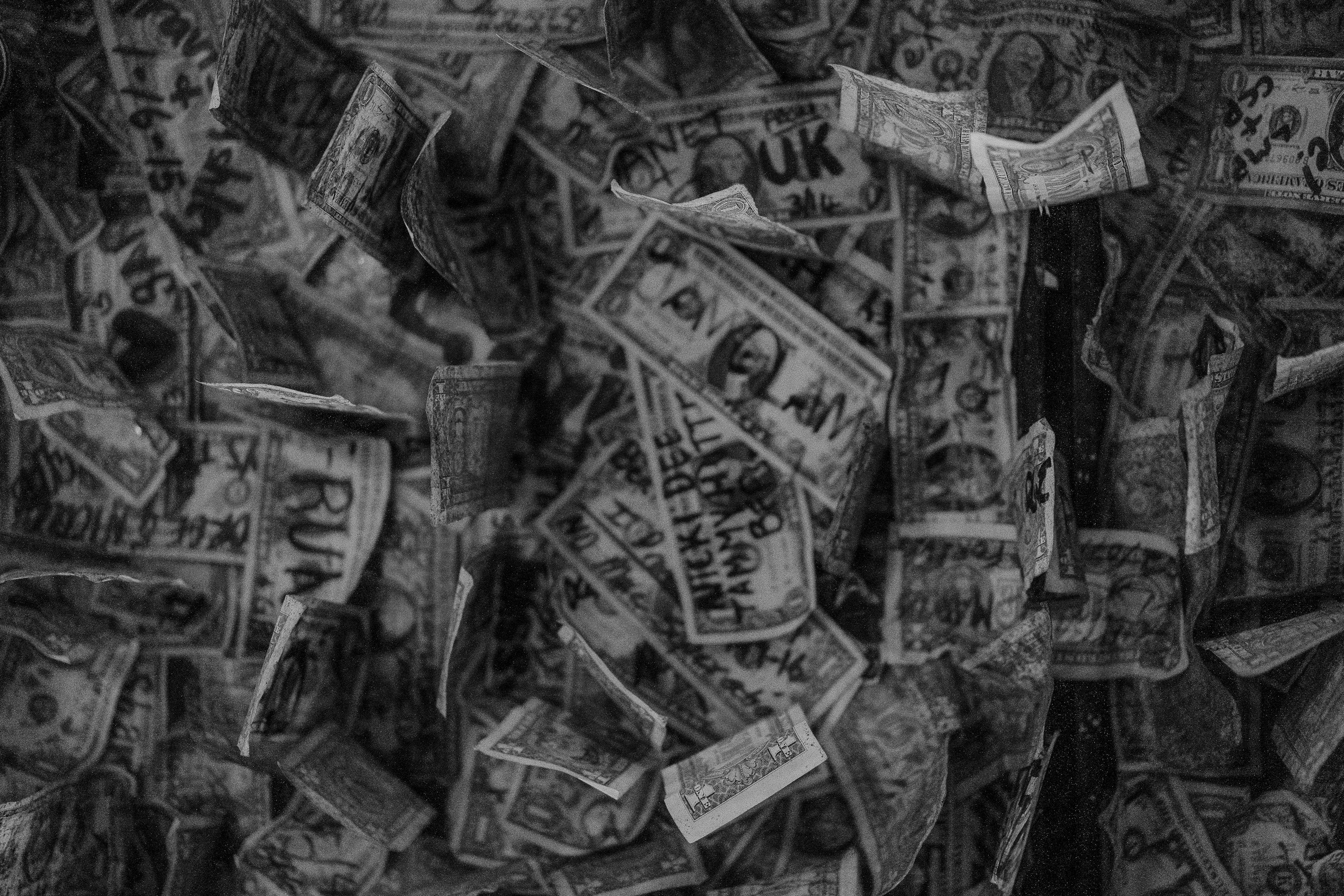 3000x2000 Black and white photograph of a pile of money
