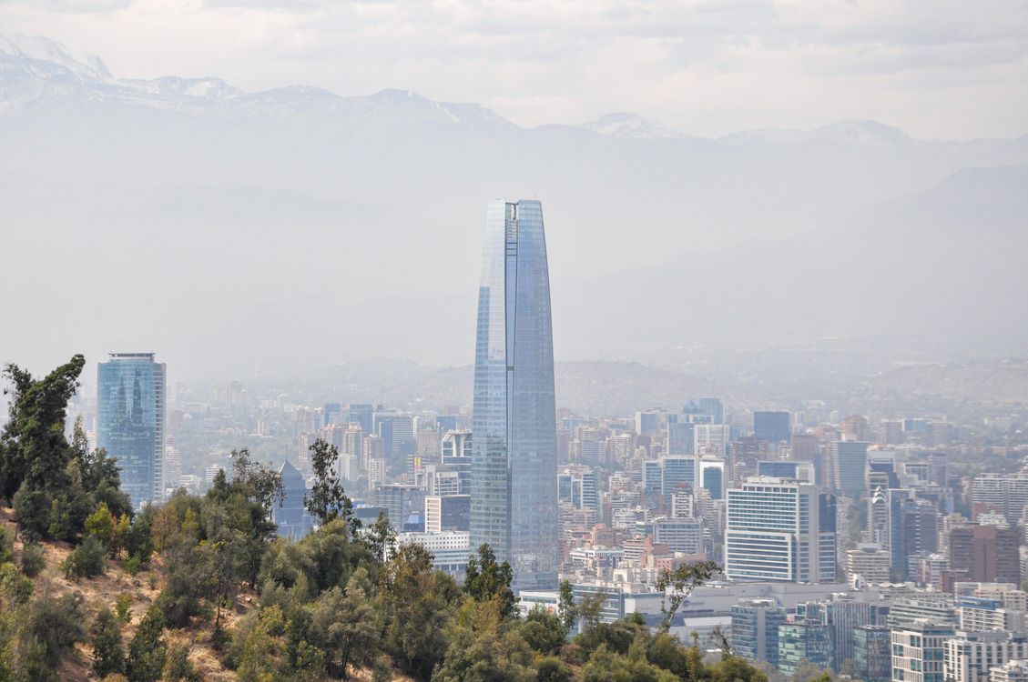 1129x750 Santiago Skyline with Andes Mountains Backdrop · Free