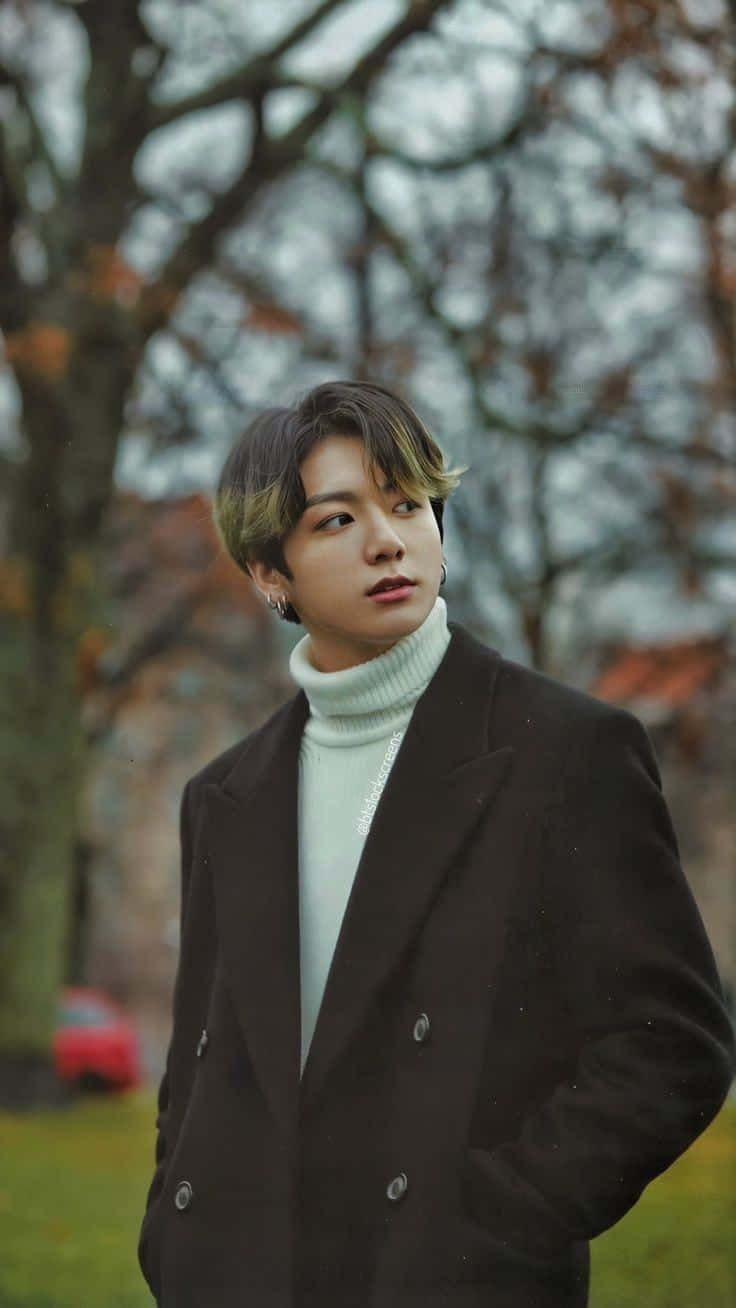 736x1308 Download Enigmatic Jungkook in a stylish black outfit Background