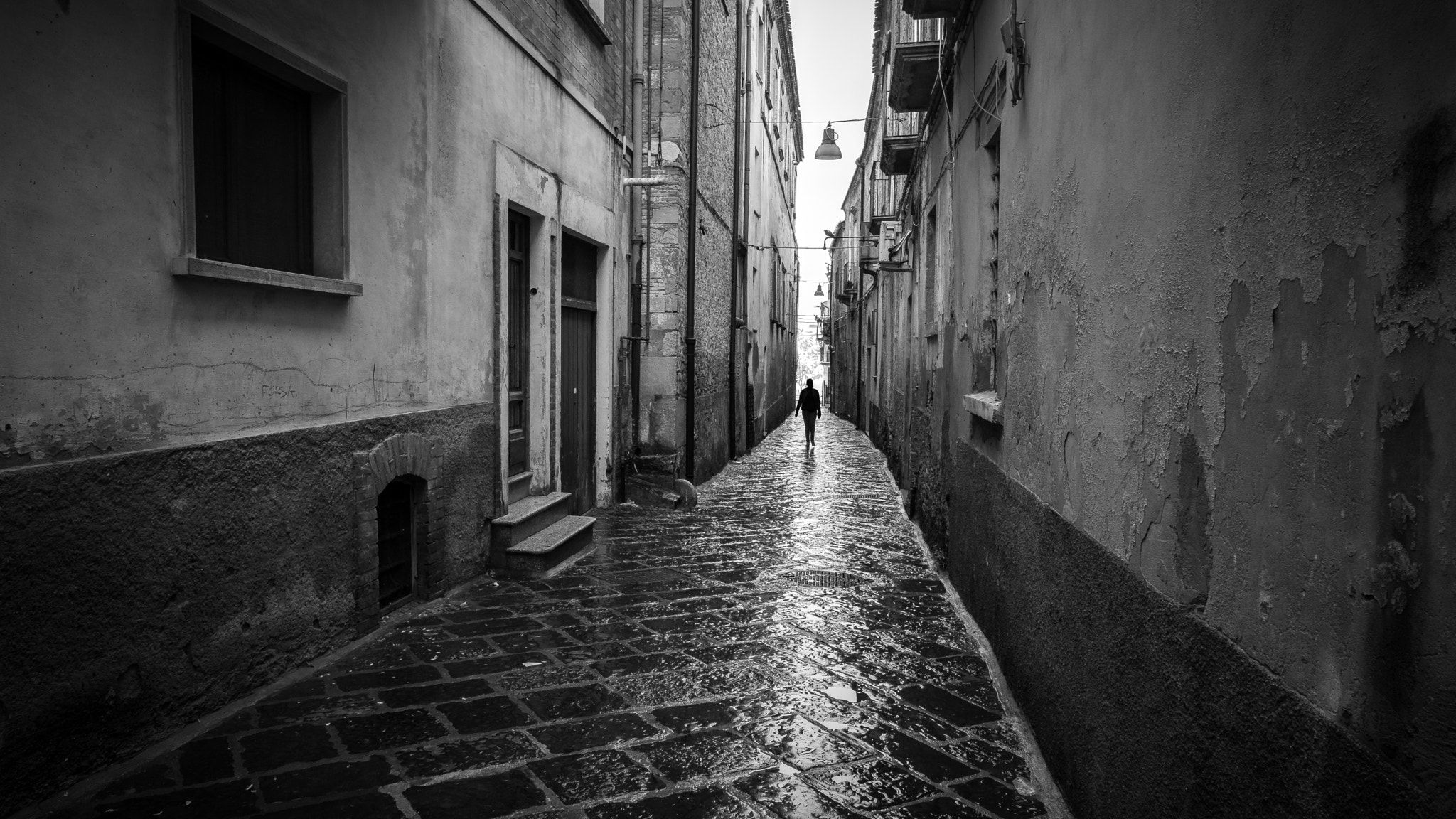 2048x1152 A Shadow Troia Italy Black And White Street Photography.jpeg