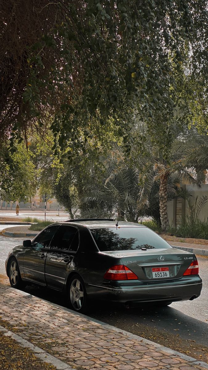 675x1200 Black Car Parked On Tree Lined Road. Lexus Ls430 Wallpaper, Lexus Lfa Wallpaper Iphone, Lexus Ls 400 Wallpaper