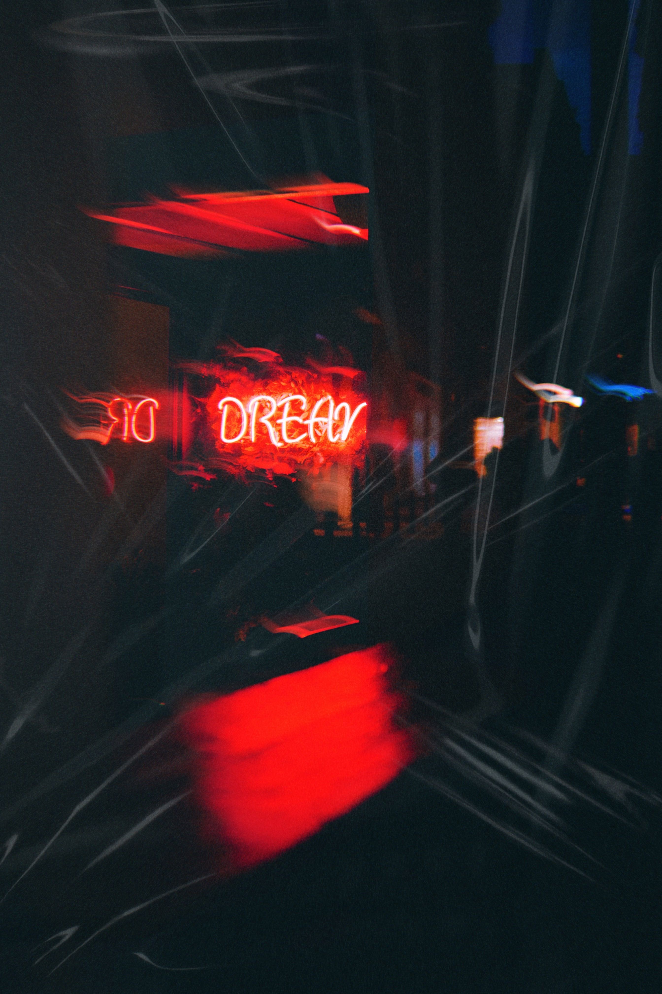 2688x4032 Blurry Picture of a Red Neon Sign · Free