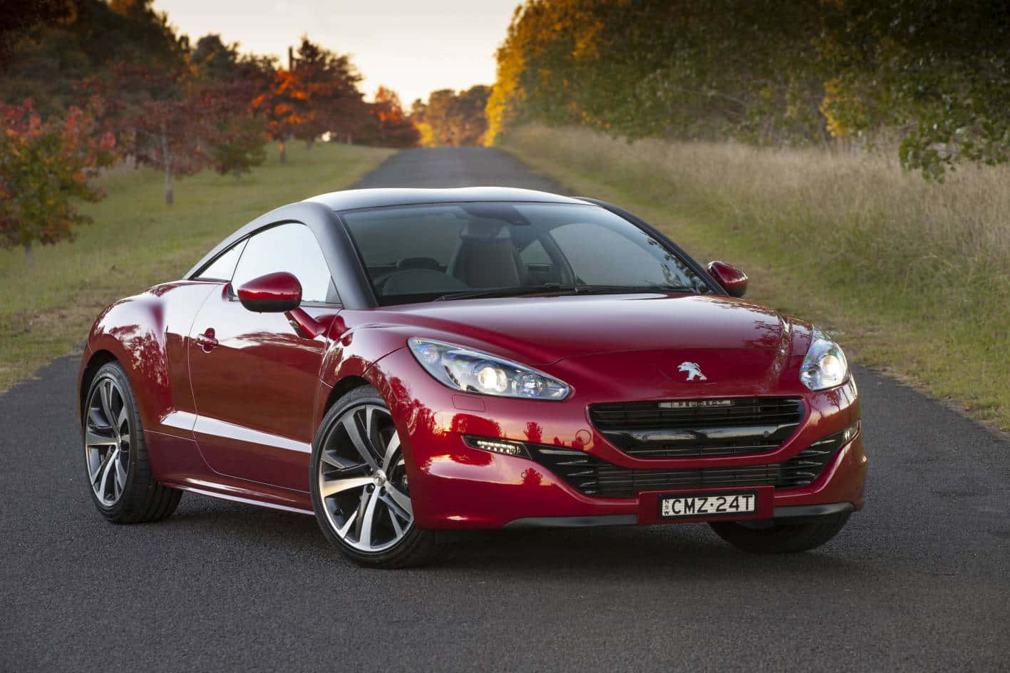 1417x944 Download Elegant Peugeot RCZ in Motion Wallpaper