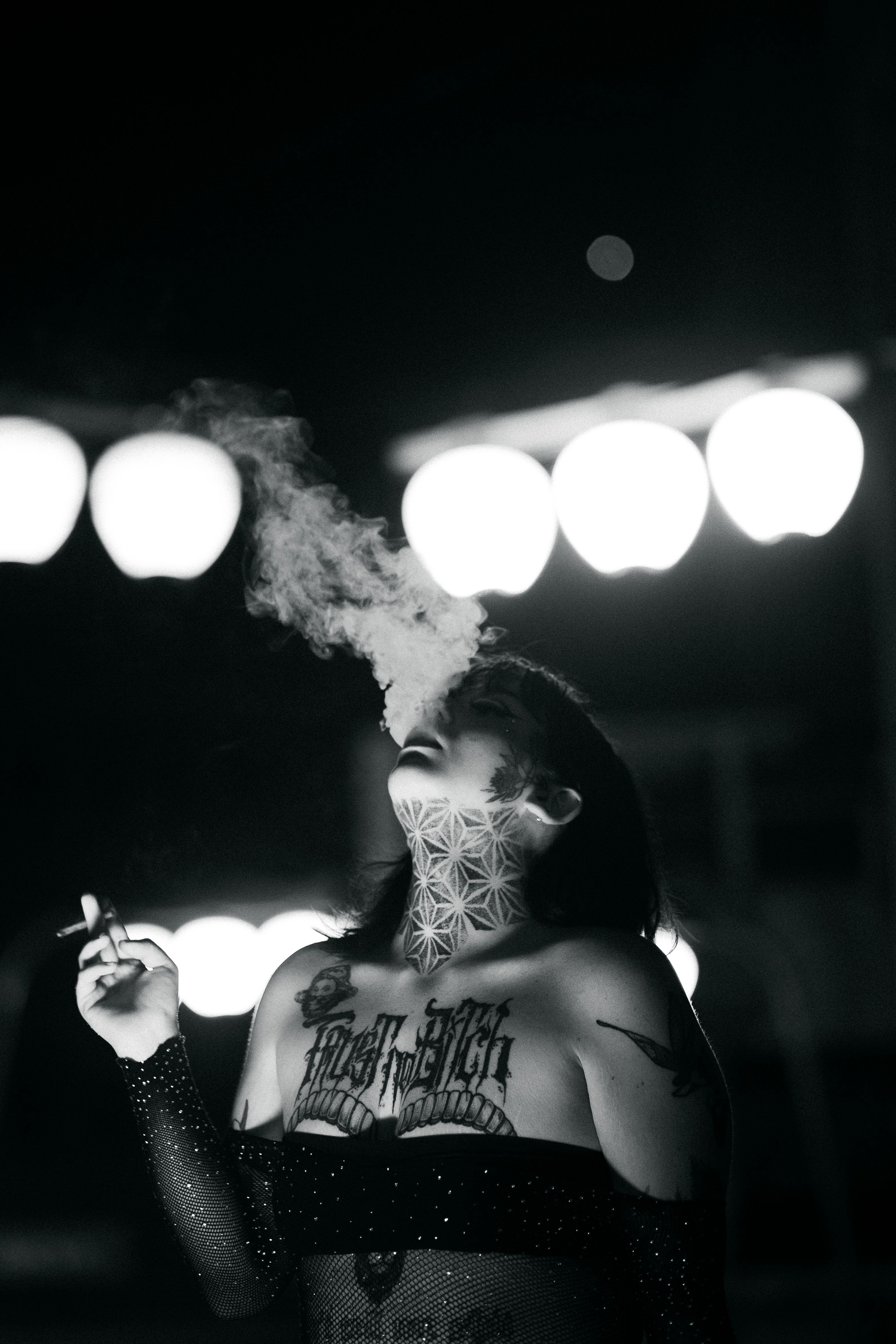 3184x4776 Grayscale Photo of a Tattooed Woman Smoking Cigarette · Free