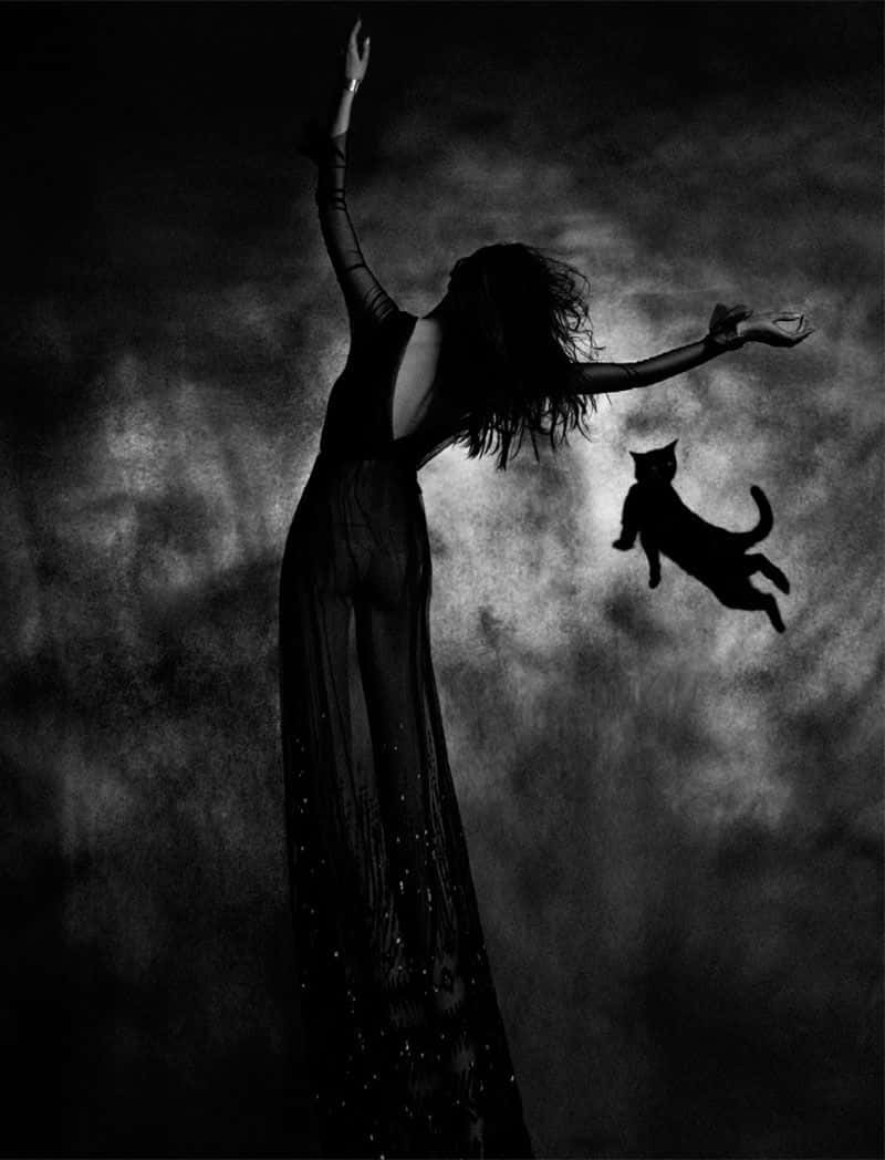 800x1048 Download A dark figure peers out from a cloud of mystery Wallpaper