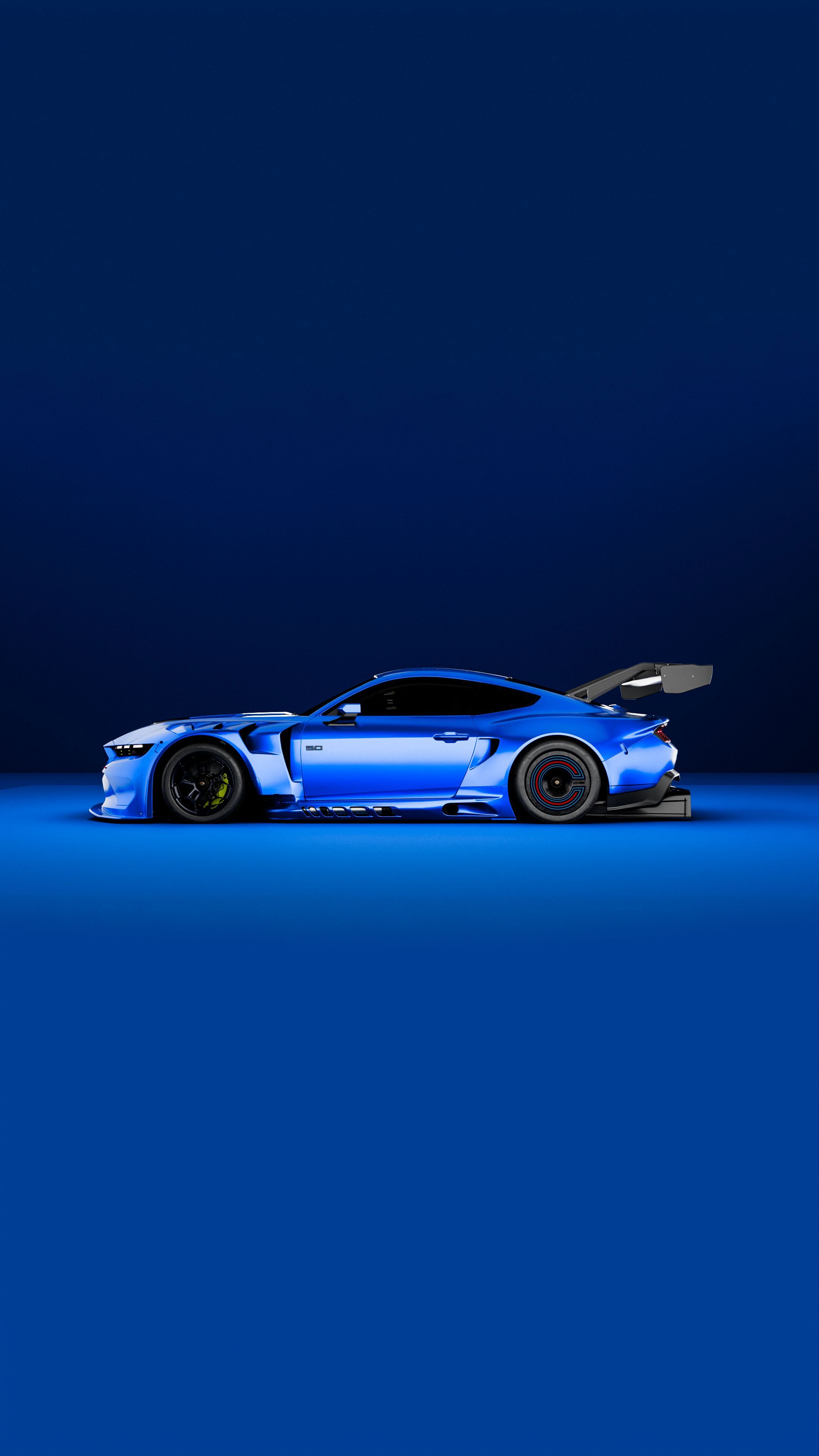 2160x3840 Sleek Blue Sports Car on Monochrome Background · Free
