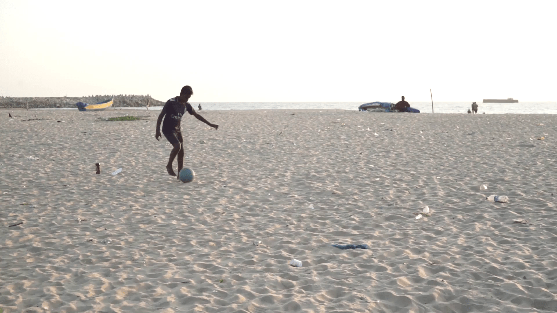 1920x1080 Playing football on the beach