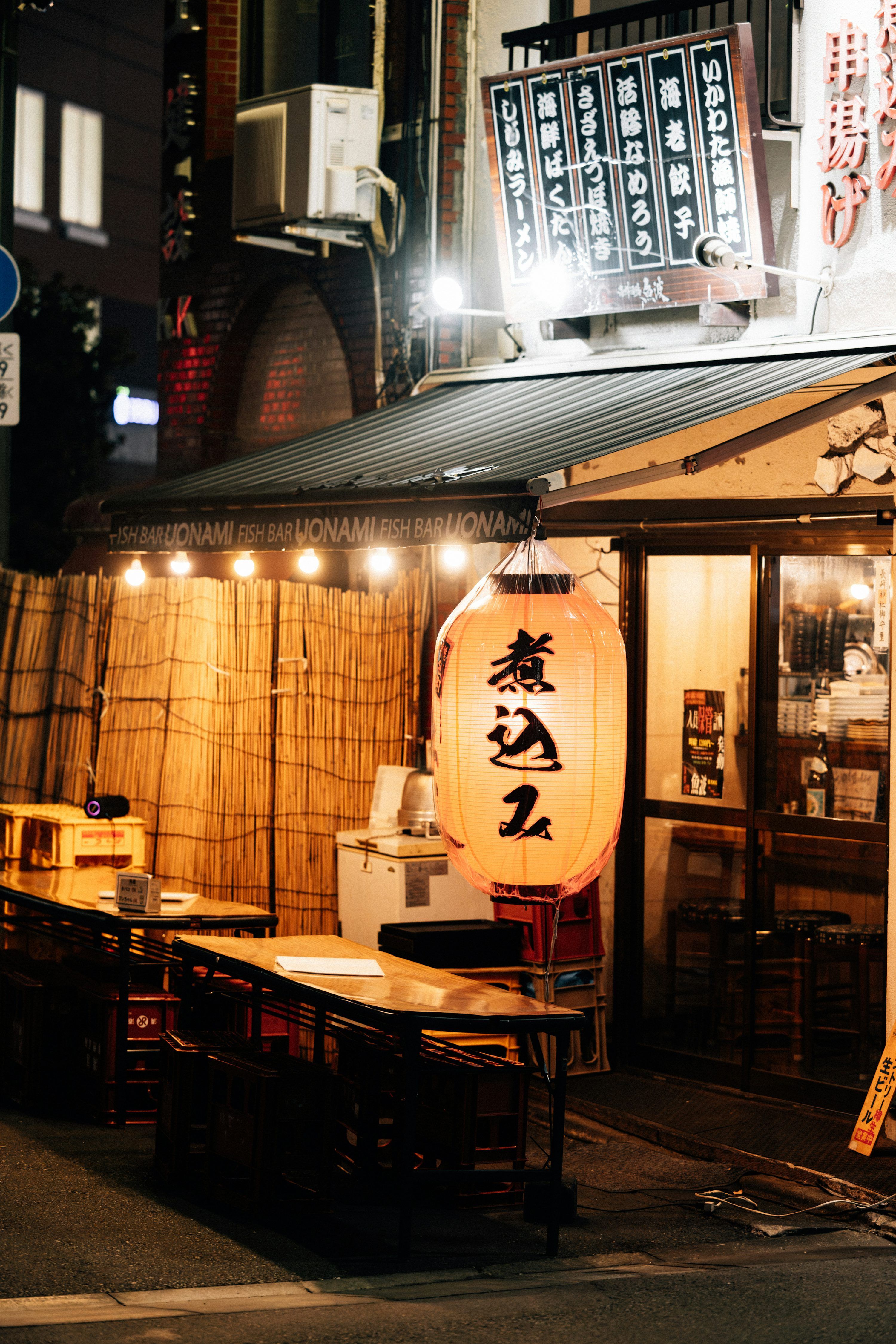 3000x4499 Japanese restaurant with outdoor seating at night