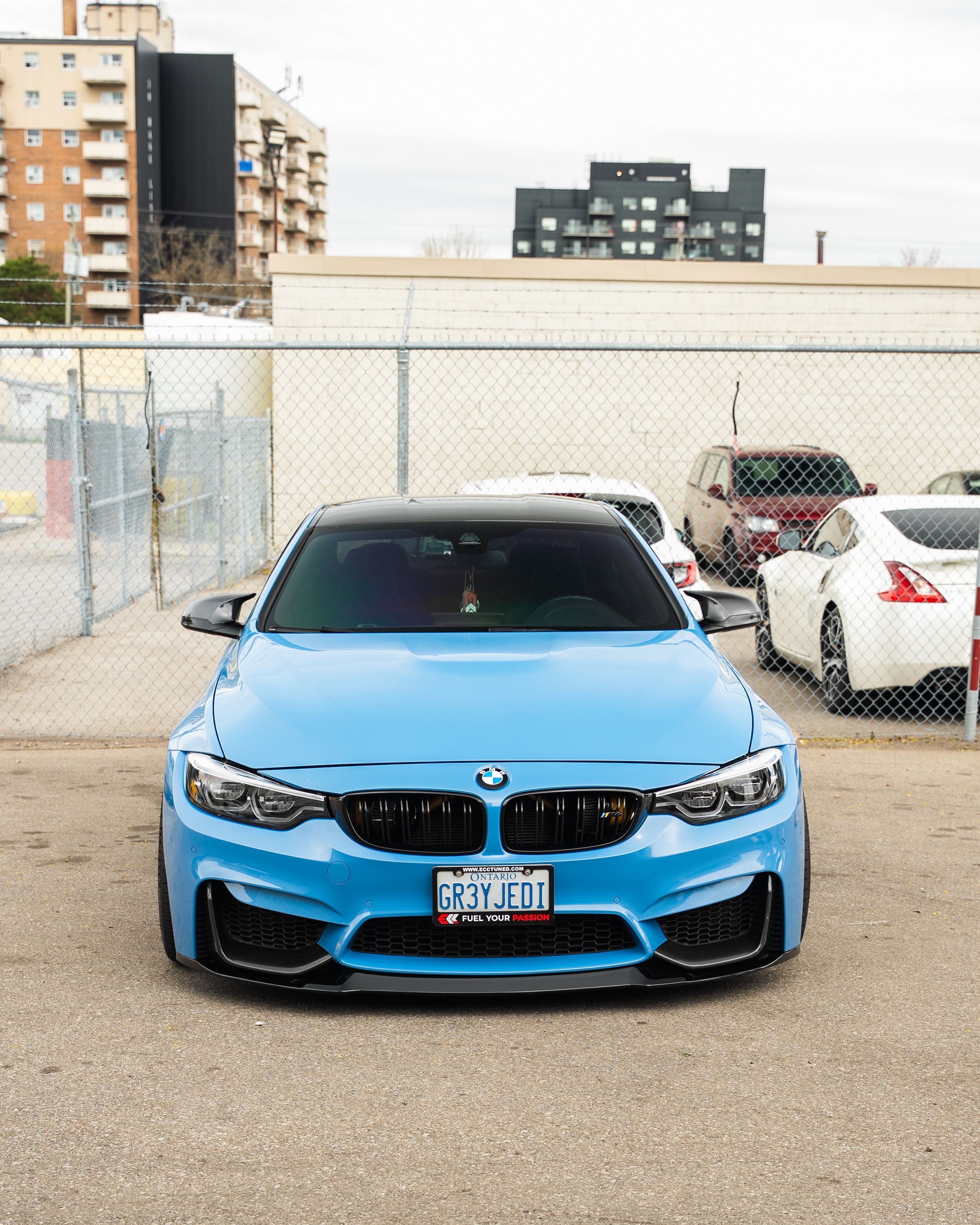 2558x3197 Sporty Blue Car in Urban Parking Lot · Free
