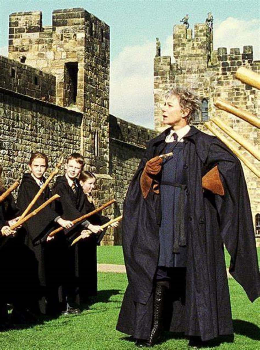 900x1211 Download Experience First Hand The Magical Art Of Broom Riding With A Lesson From The Hogwarts Flying Lessons Wallpaper