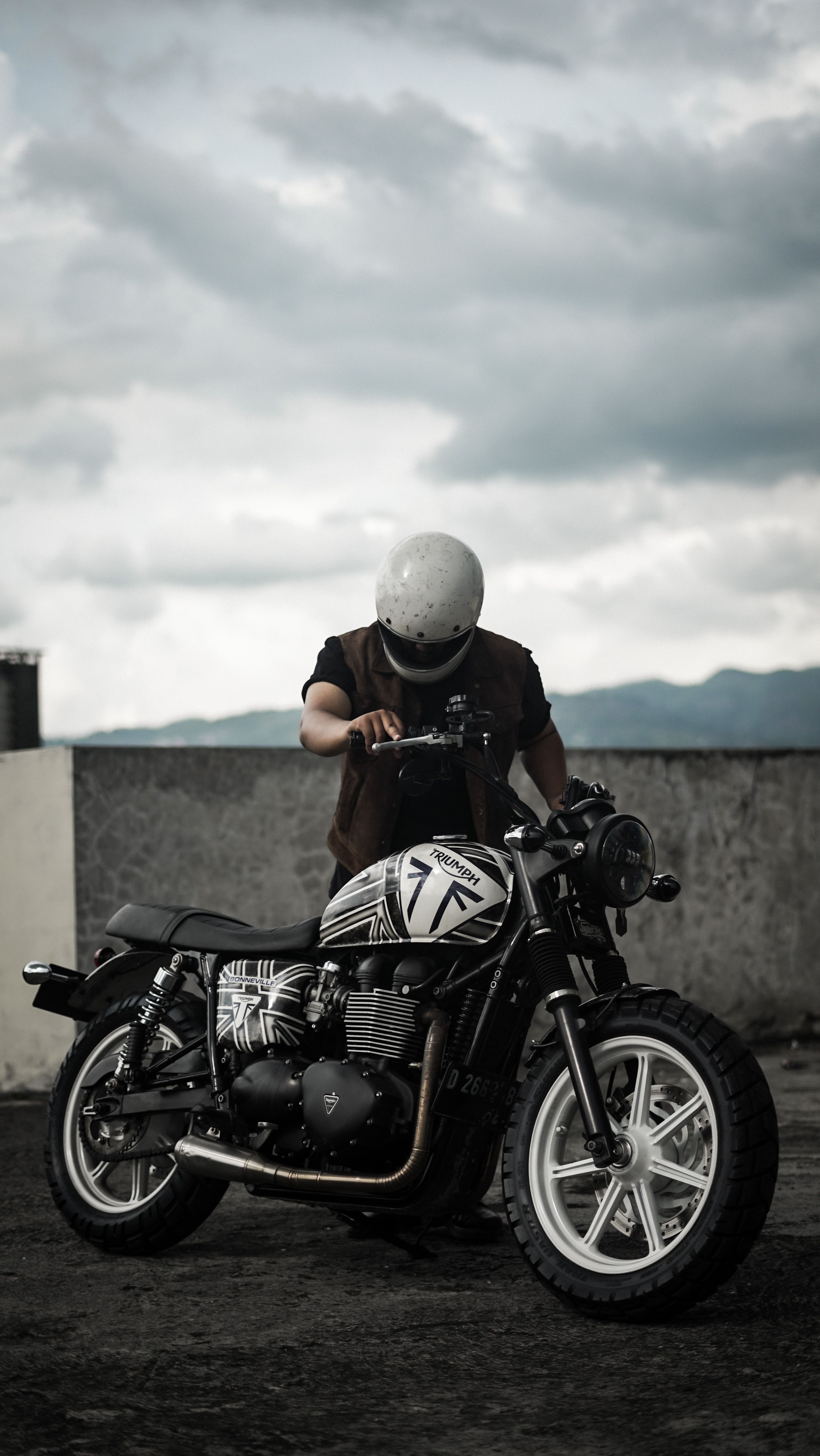 3180x5651 Man Standing by His Motorcycle · Free