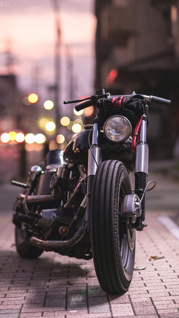 720x1280 Viaggio by Marcel parked on the side of the road. Bobber motorcycle wallpaper, Motorcycle on a dark street, Motorcycle pics