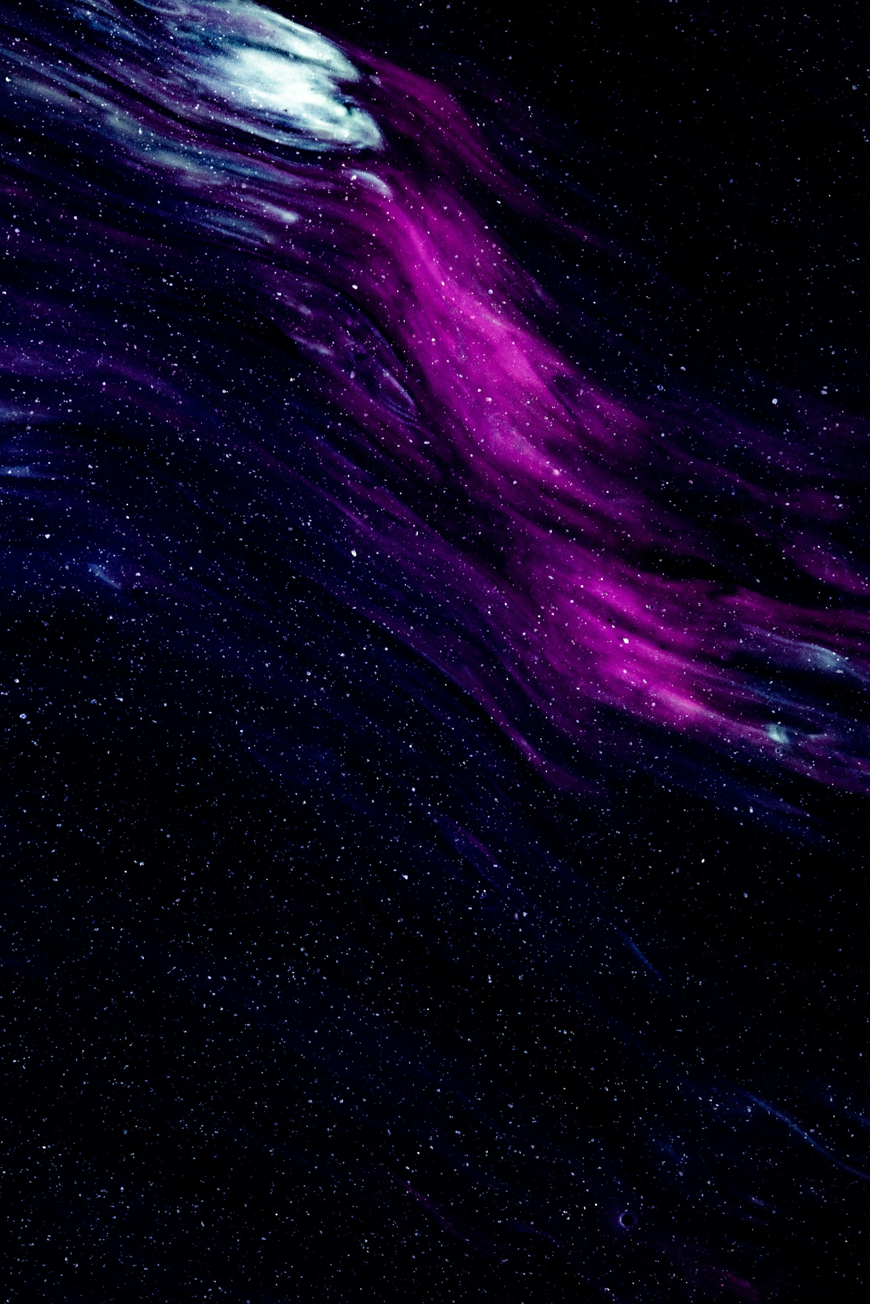 3000x4497 A purple and black background with stars