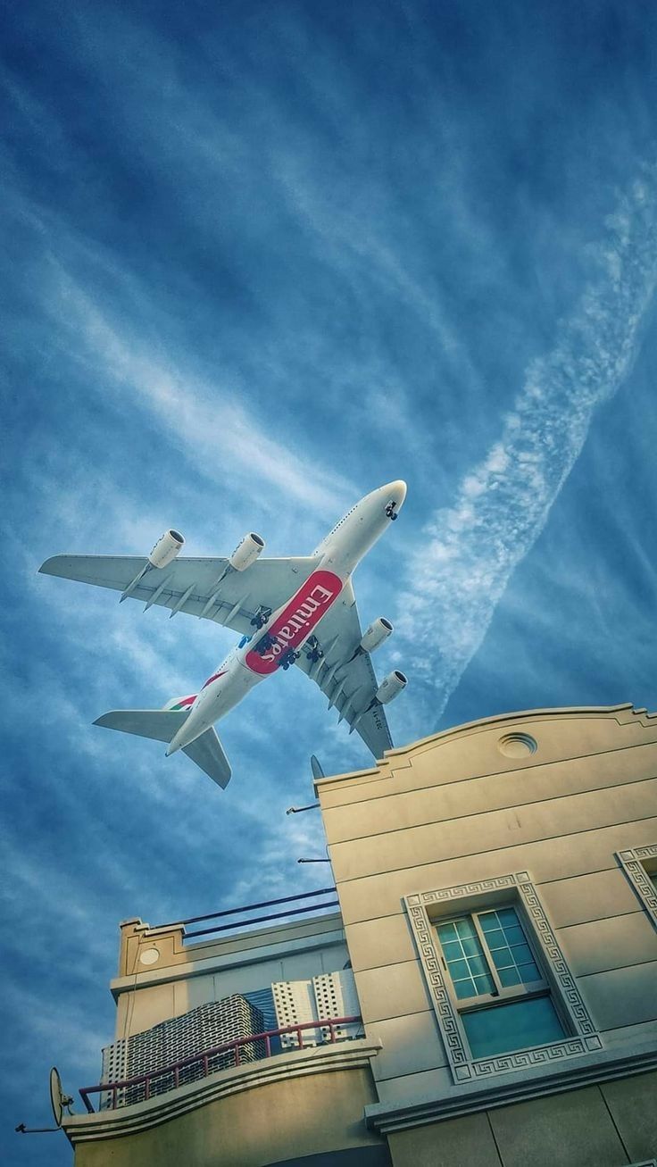 736x1307 Emirates Airline Flight Over Dubai Skyline. Emirates plane wallpaper, Emirates aesthetic wallpaper, Emirates plane aesthetic