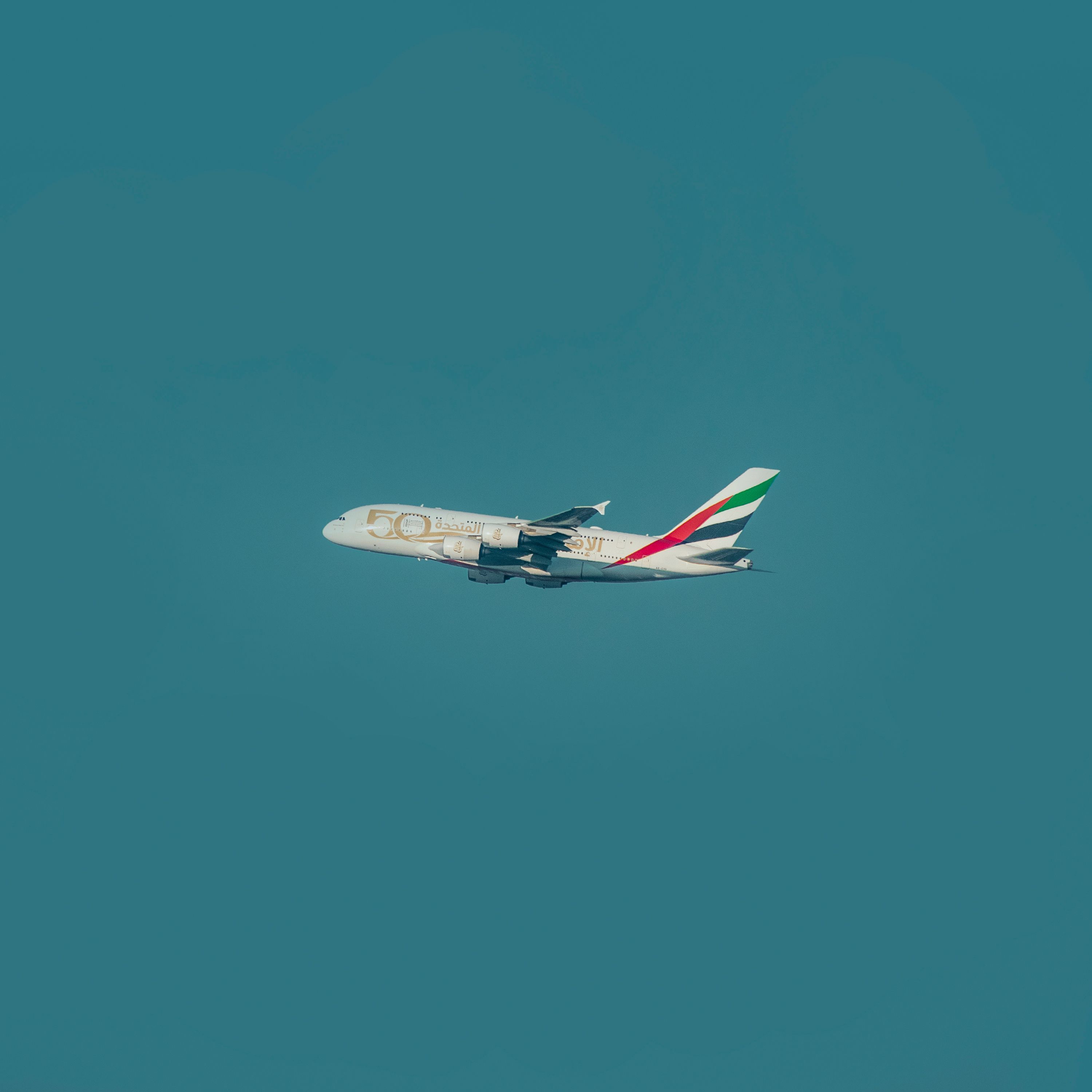 3000x3000 An Airplane Flying in the Blue Sky · Free