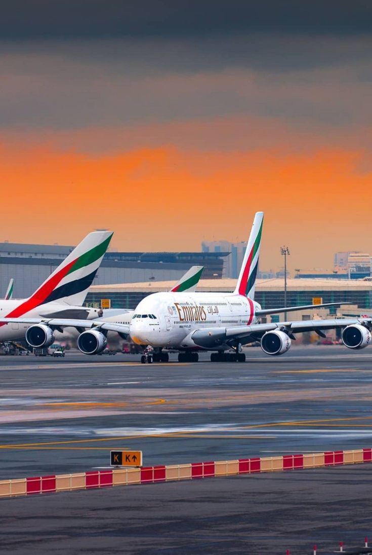 735x1095 Airplanes Parked at Airport. Emirates phone wallpaper, A350 4k wallpaper, Emirates airbus a380 wallpaper