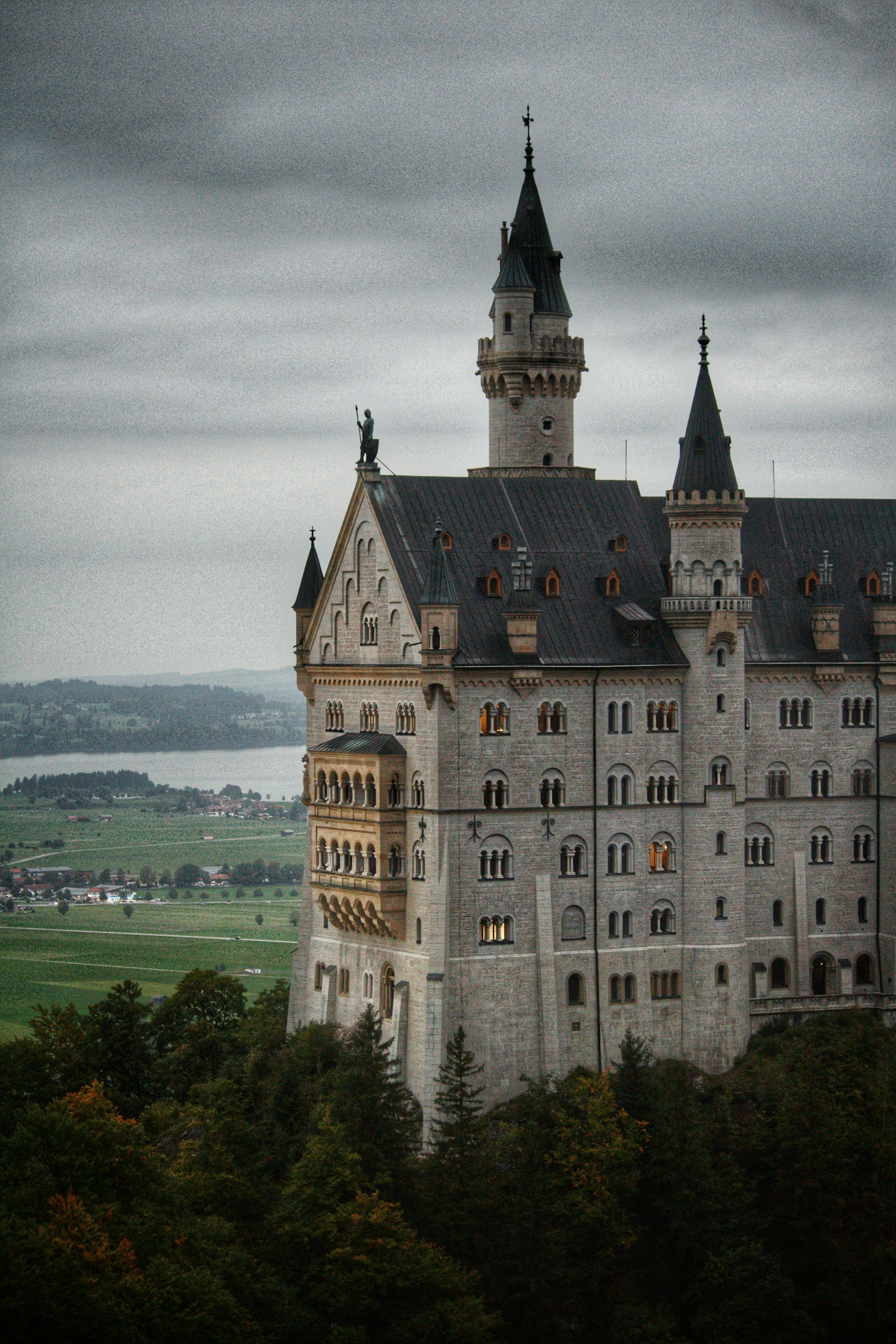 3000x4500 A large castle with a clock tower on top of it
