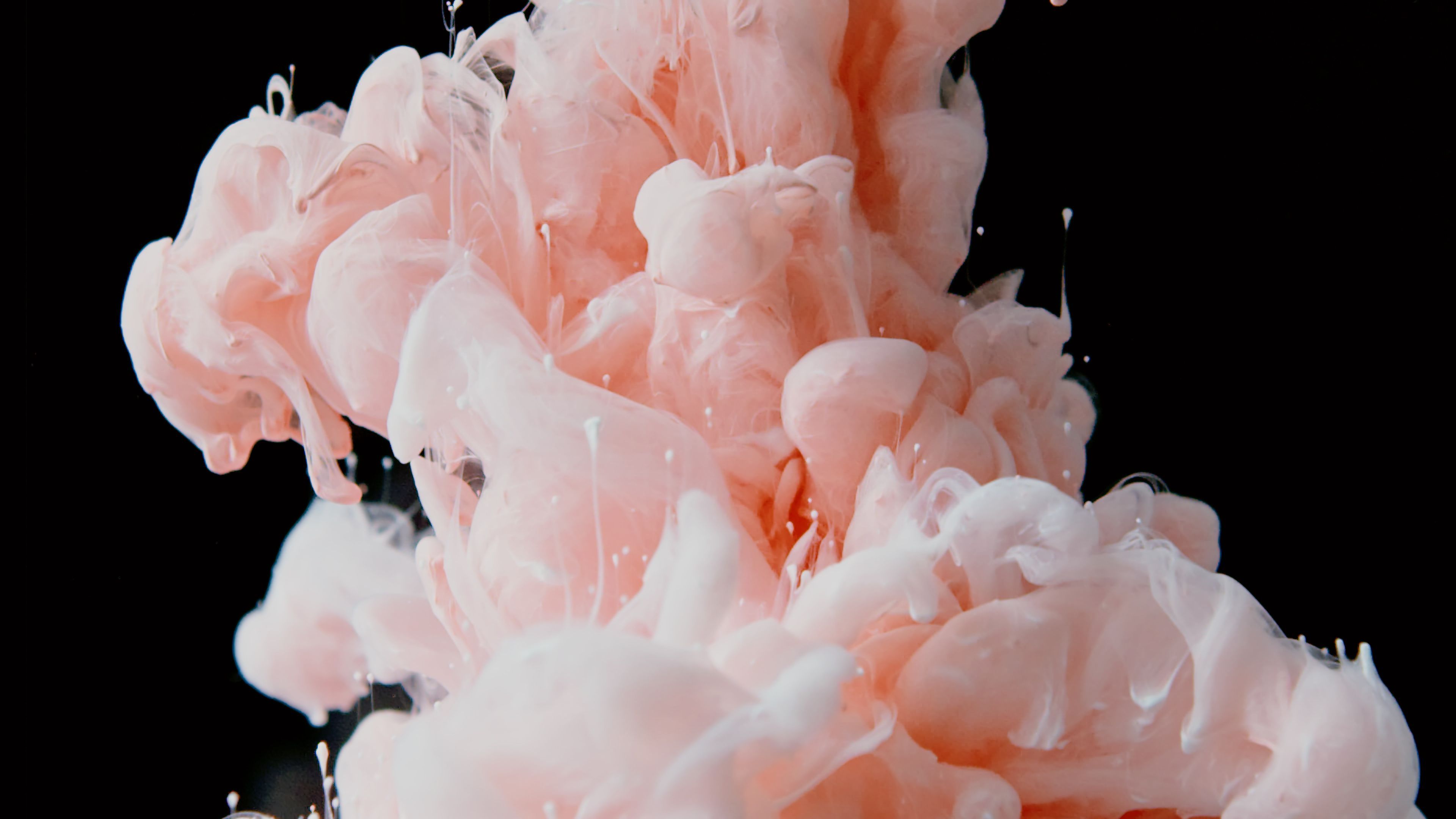 3840x2160 Peach Colored Liquid with Black Background · Free