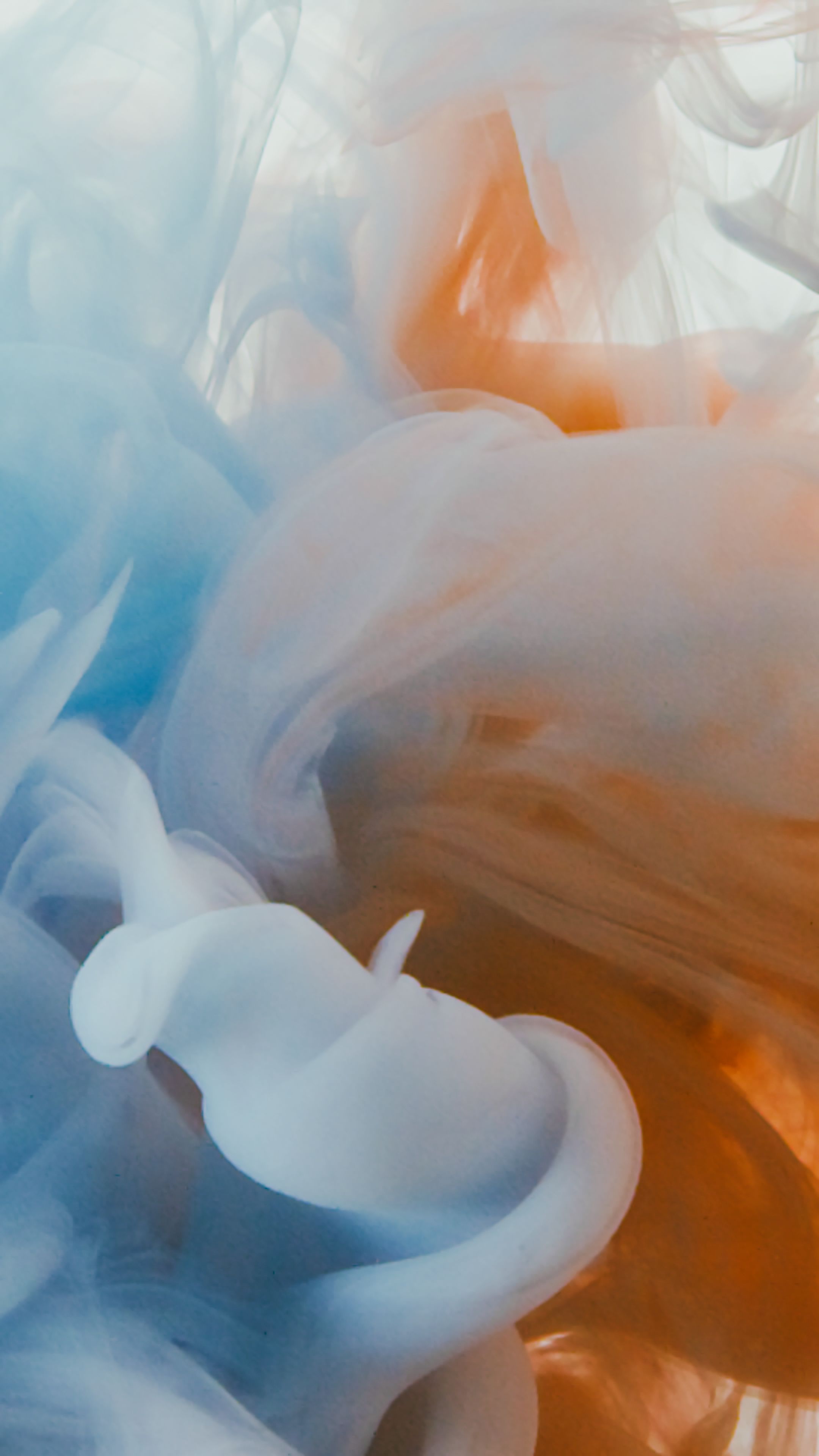 2160x3840 Mixing Blue and Orange Smoke · Free