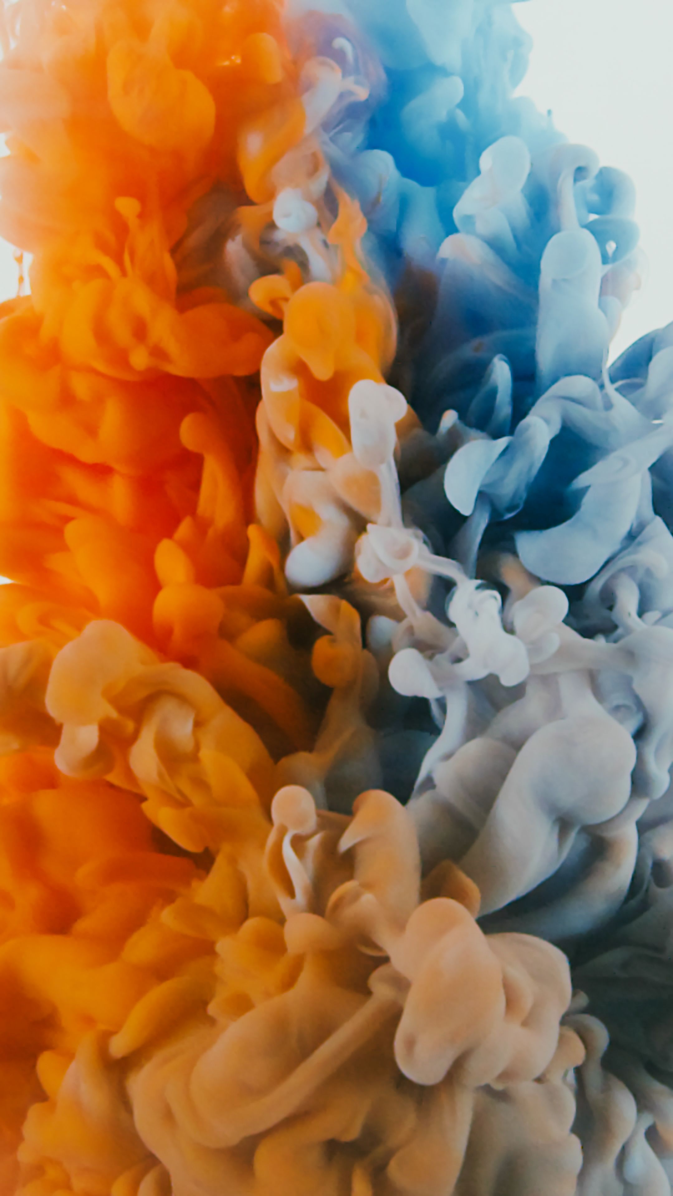 2160x3840 Mixing Blue and Orange Smoke · Free
