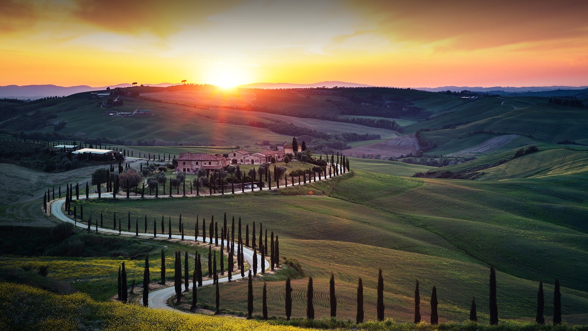 1920x1080 Tuscany landscape with winding country road at sunset, Val D'orcia, Italy. Windows Spotlight Image