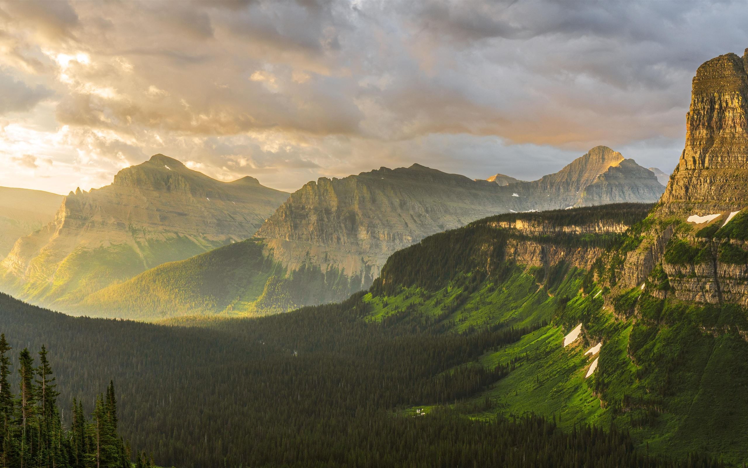 2560x1600 stormy sunrise at glacier national park 8k iMac Wallpaper Download