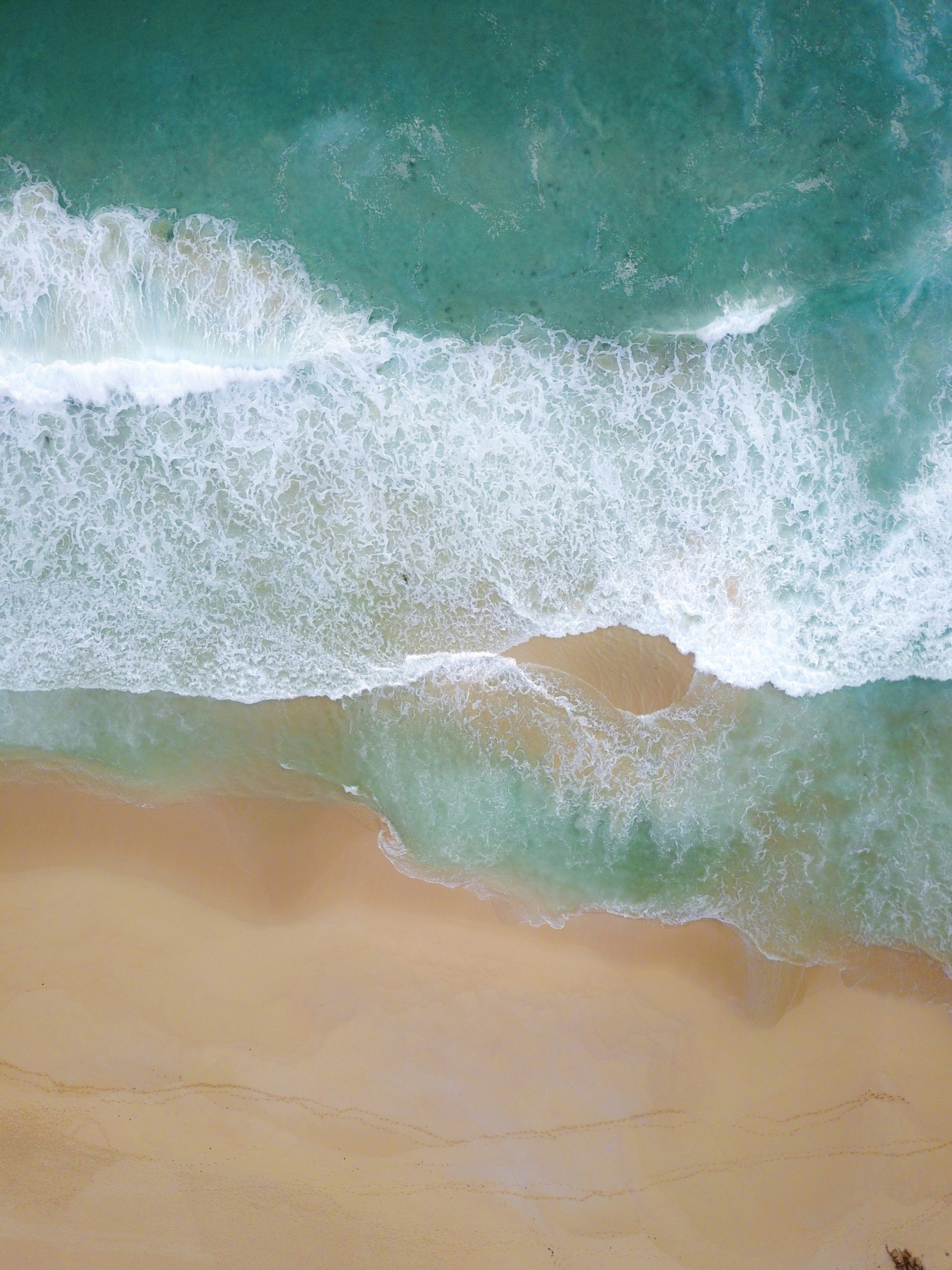 3000x4000 Ocean waves crashing on shore during daytime