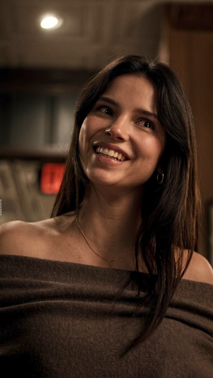 720x1280 Woman with brown hair smiling. Woman smiling from behind, Nikki freeman, Obsession wallpaper