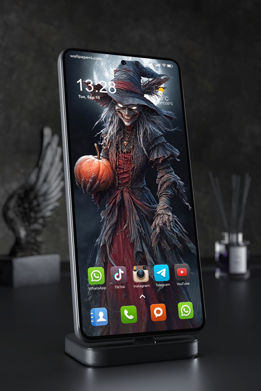 1067x1600 Creepy Halloween Witch With Glowing Pumpkin. Wallpaper №4664