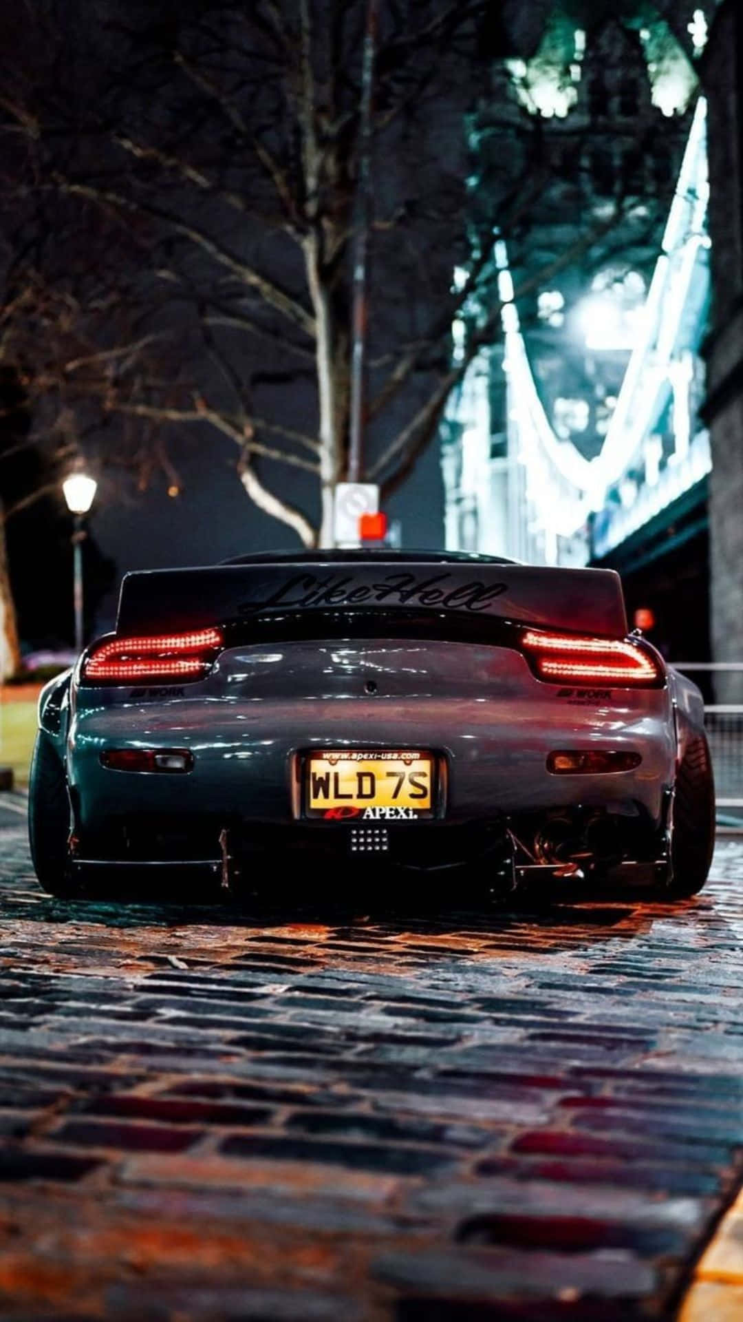 1080x1920 Download A Multi Colored JDM Car Looking Stunning Over Cloudy Night Sky Picture