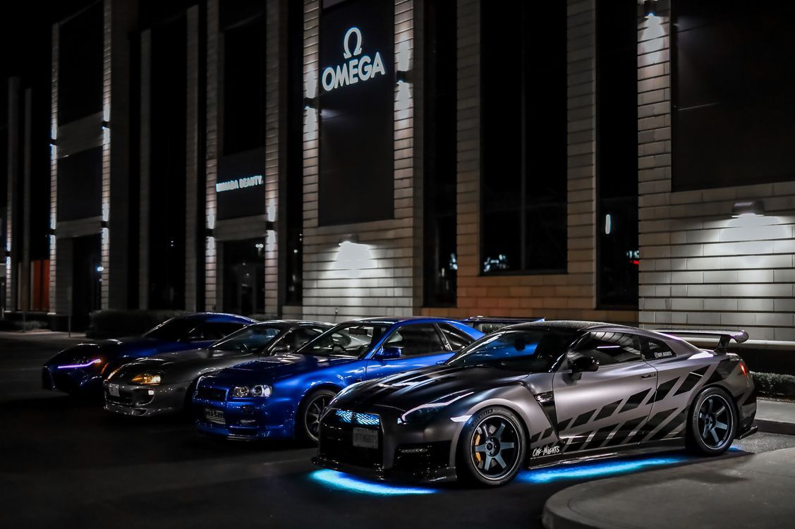 1127x750 Japanese Sports Cars on the Parking Lot at Night · Free