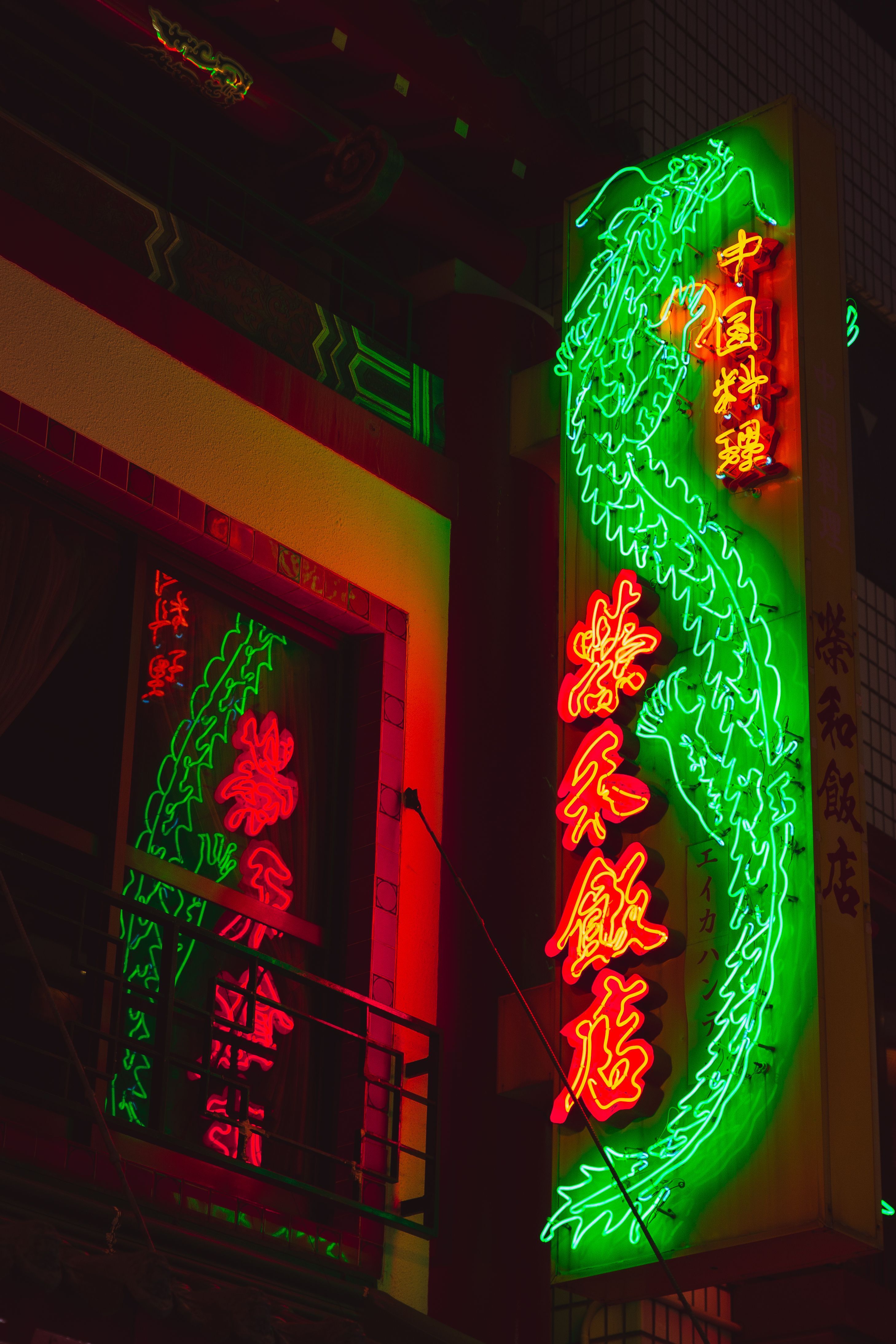 2916x4374 Colorful neon sign hanging near balcony · Free
