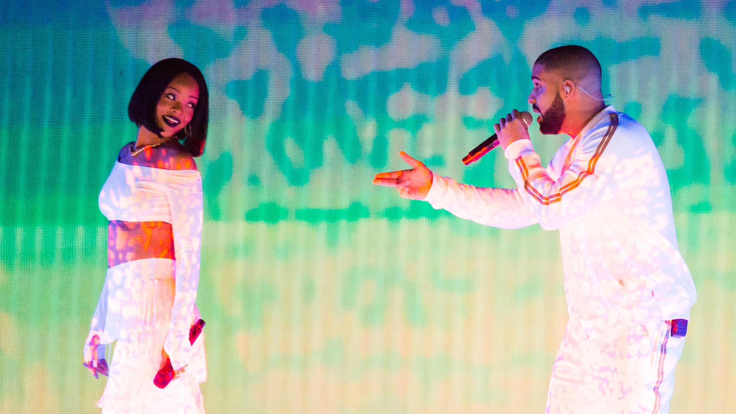 2560x1440 Drake and Rihanna Got Matching Camo Shark Tattoos