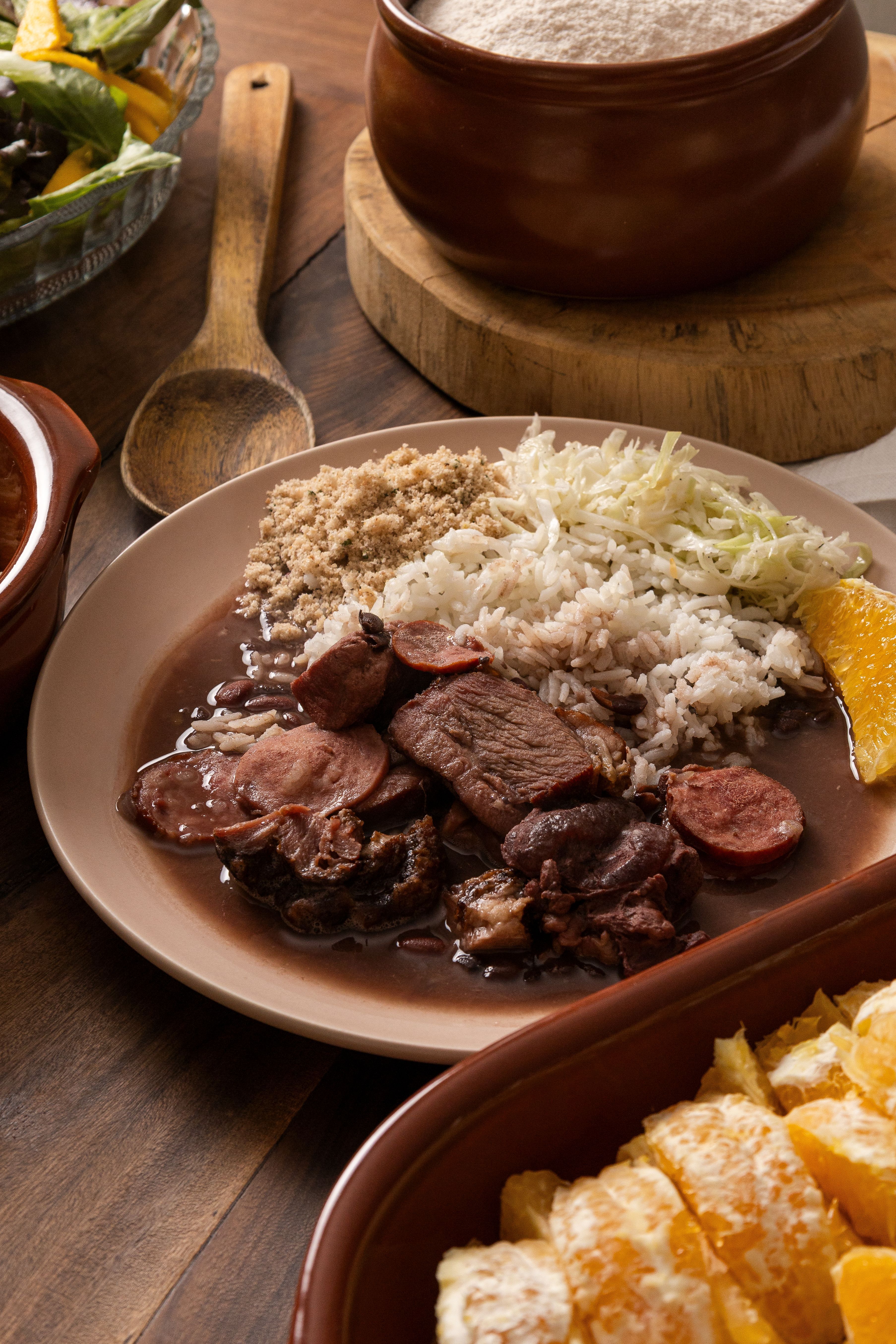 3613x5420 Traditional Brazilian Feijoada with Rice and Sides · Free