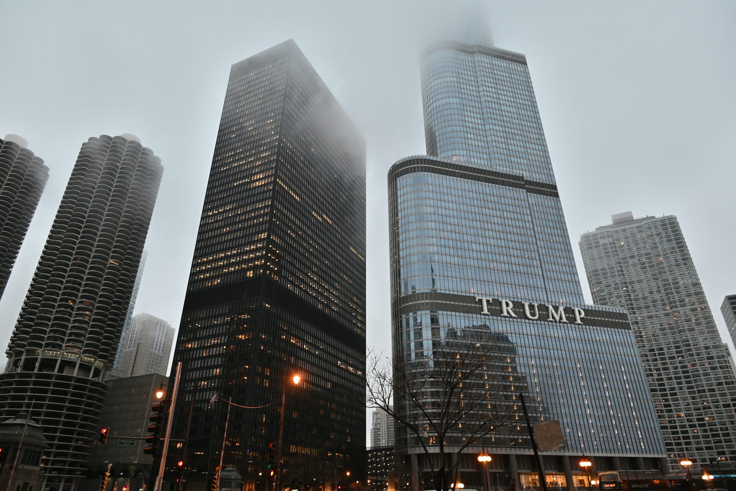 3000x2003 A group of tall buildings in a city photo