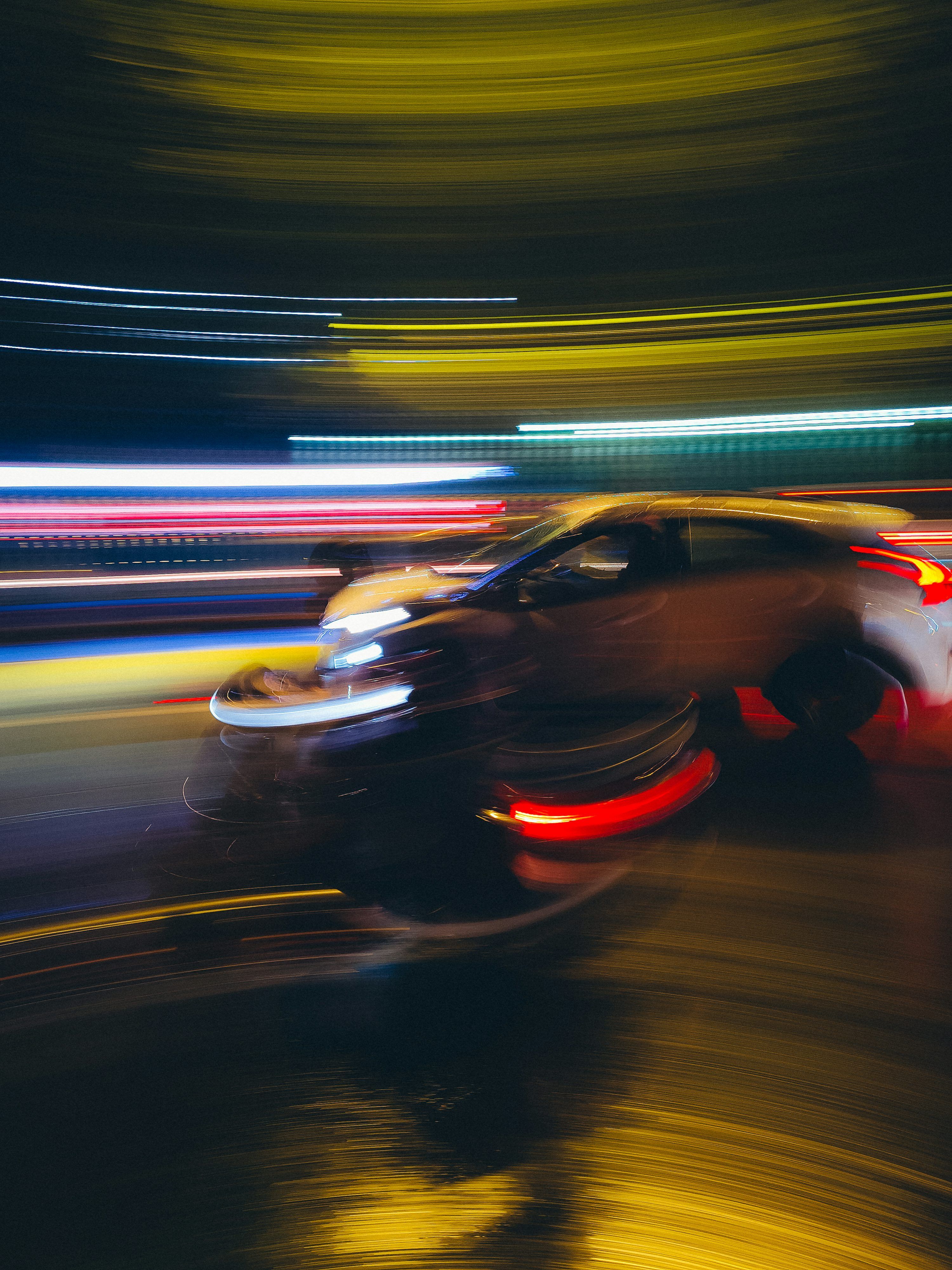 3000x4000 Car driving at night with motion blur