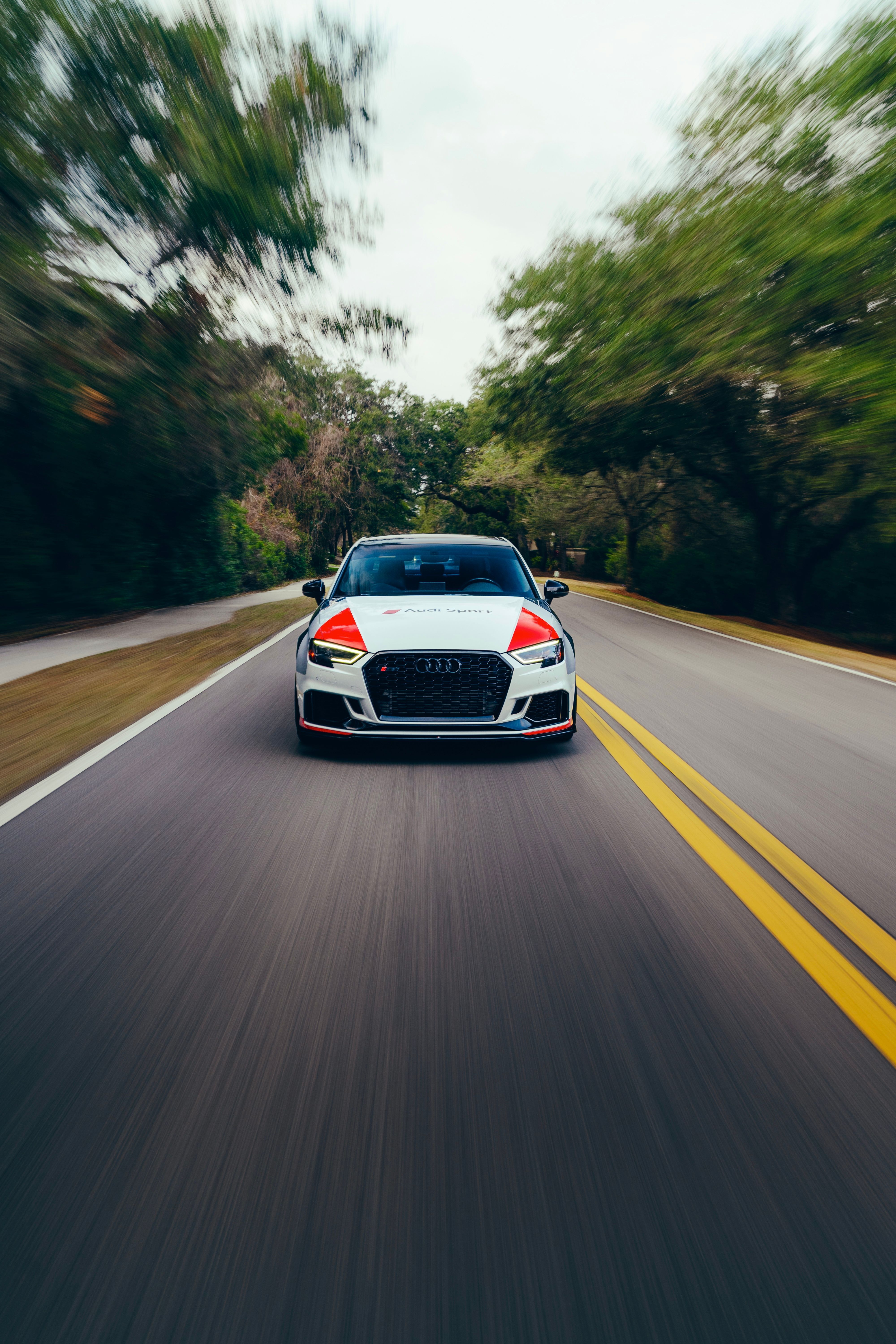 4000x6000 Dynamic Car on Open Road with Motion Blur · Free