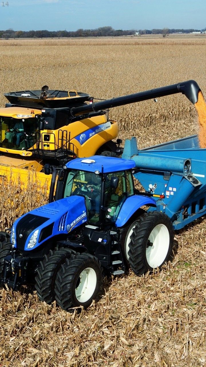 720x1280 Two Blue and Yellow Farm Tractors in Corn Field. Agriculture picture, New holland agriculture, Country background