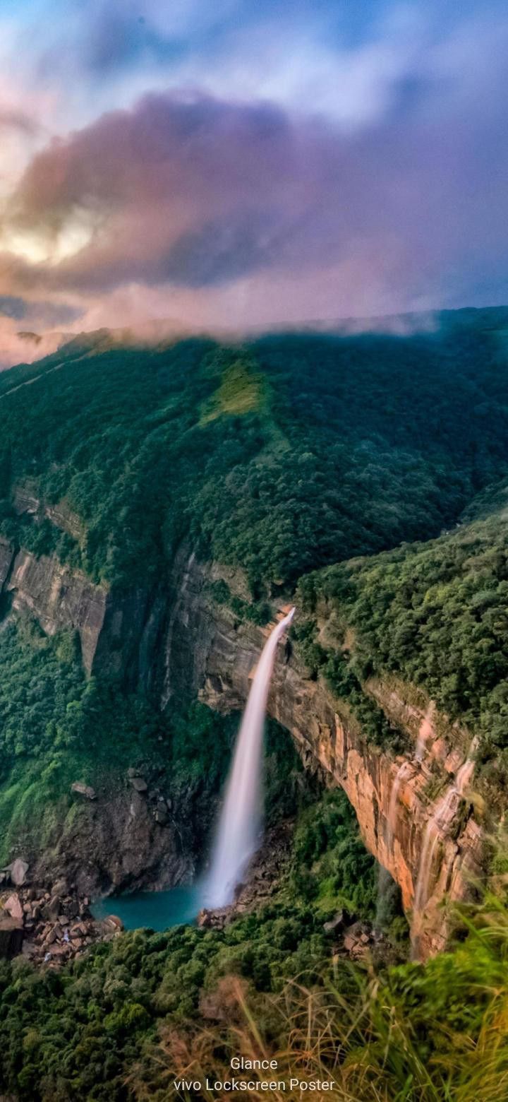 720x1560 Sunset Waterfall in a Lush Valley. Waterfall iphone wallpaper, India nature wallpaper, Waterfall in mountains wallpaper
