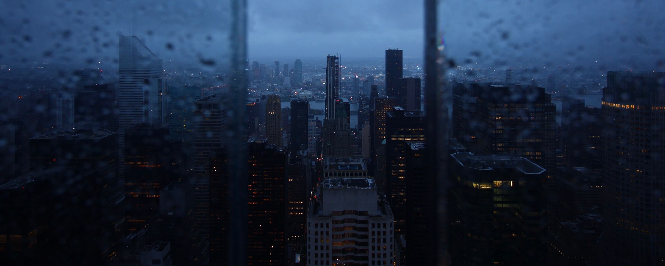 2560x1024 Download wallpaper 2560x1024 night city, window, rain, skyscrapers, aerial view ultrawide monitor HD background
