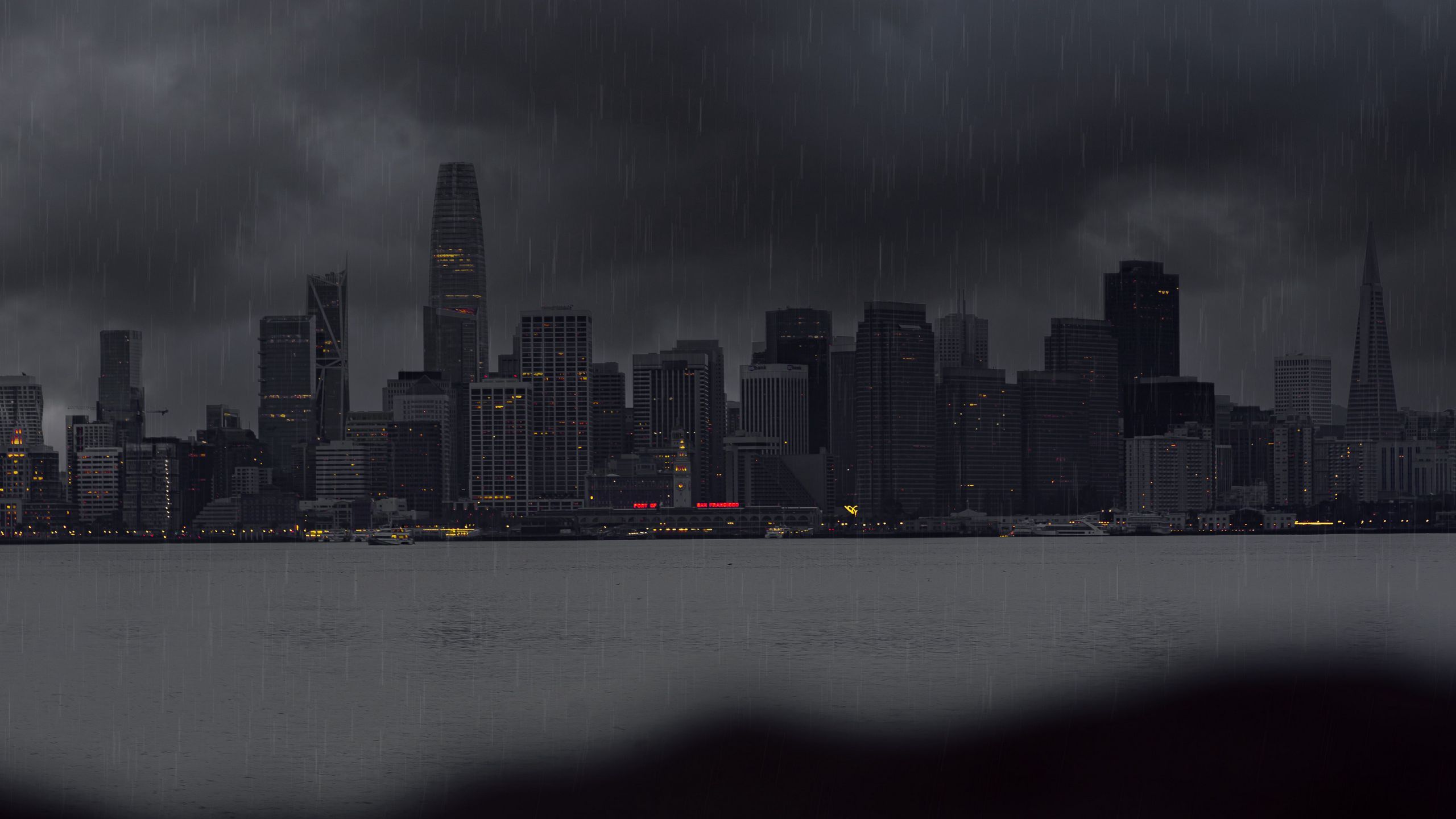 2560x1440 Download wallpaper 2560x1440 city, rain, buildings, river, coast widescreen 16:9 HD background