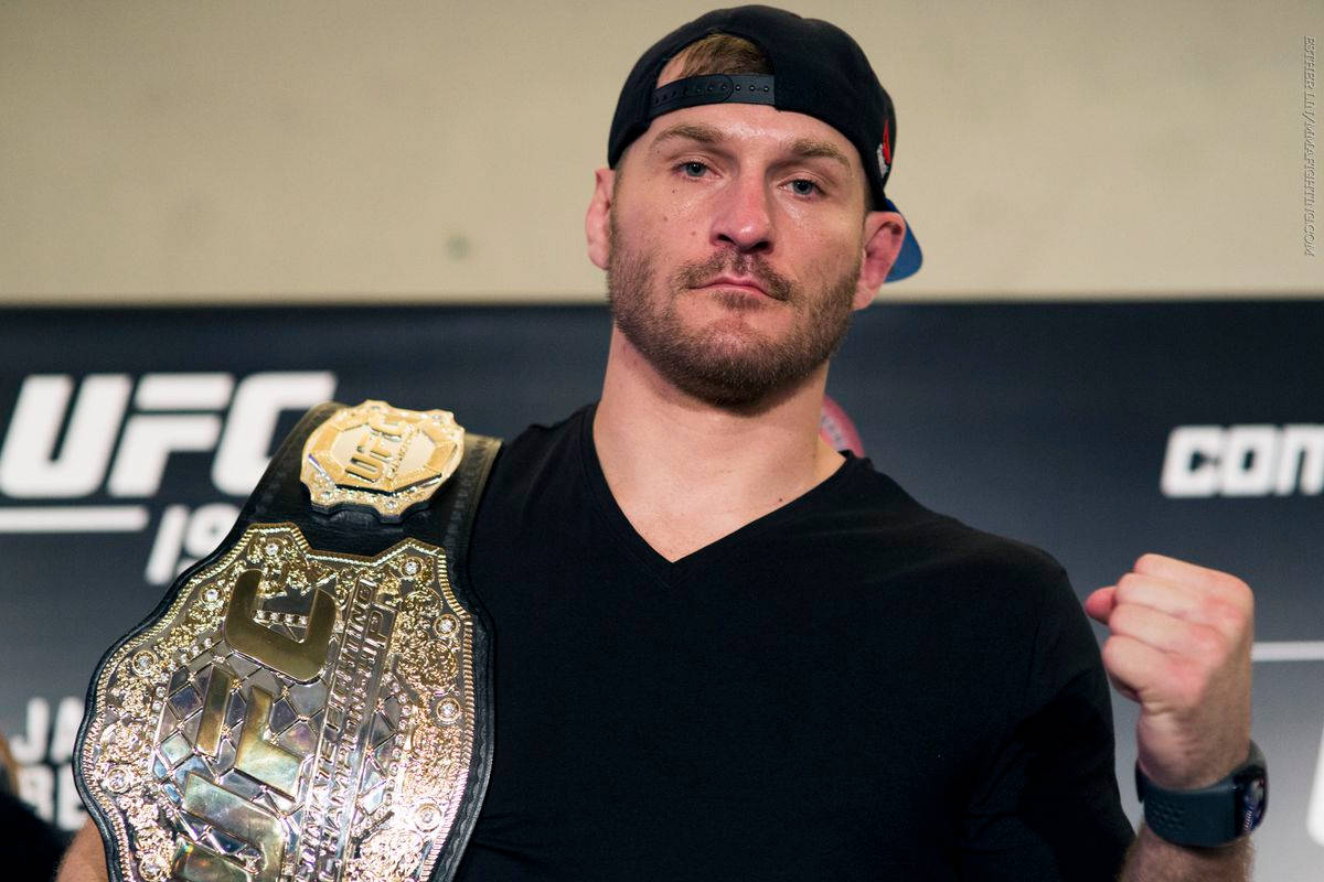 1200x800 Download Pride of the Octagon, Stipe Miocic Posing with UFC Title Belt Wallpaper