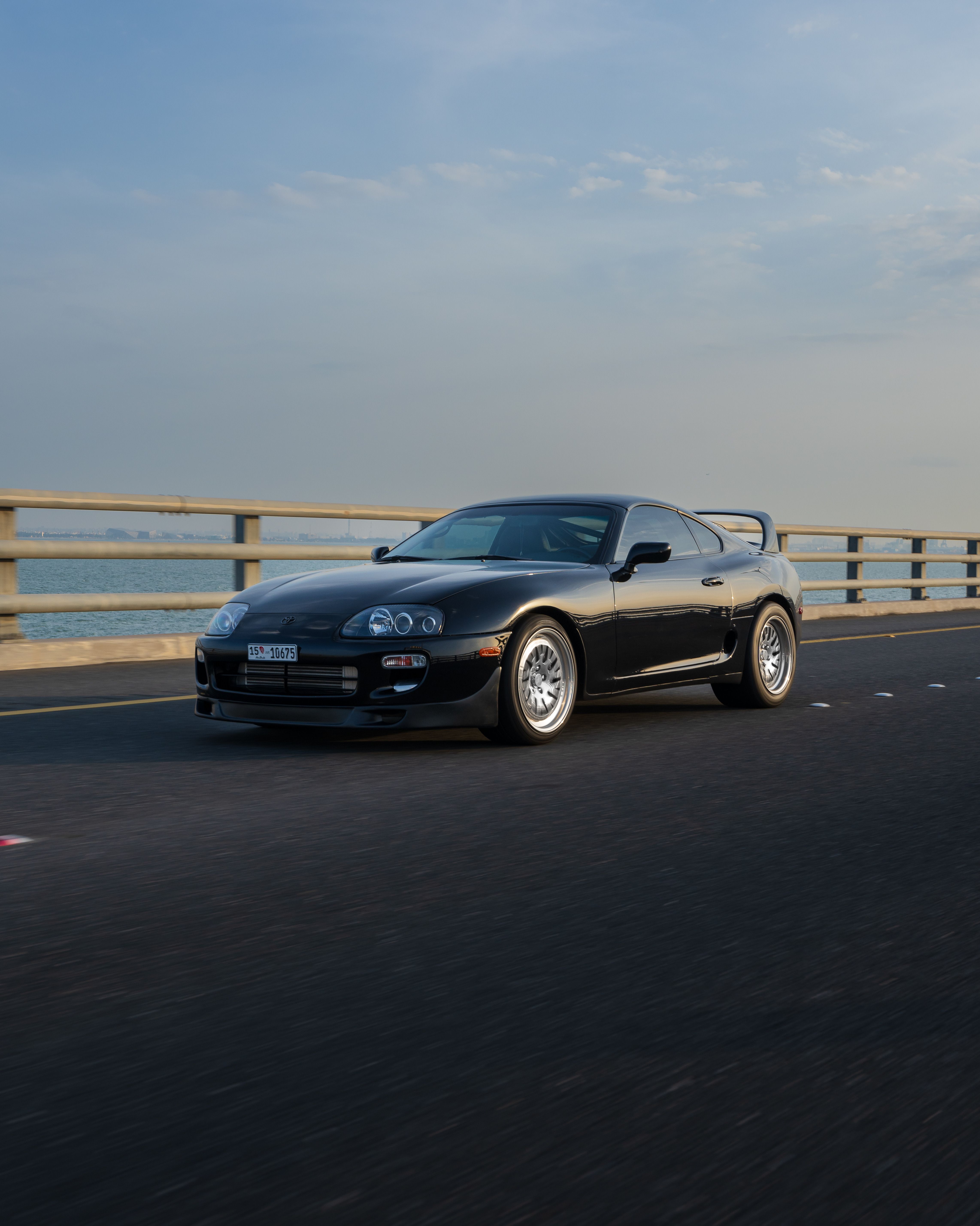 4567x5709 Dynamic Toyota Supra MK4 in Motion on Open Road · Free