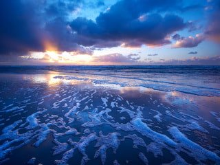 320x240 Sunset waves wallpaper