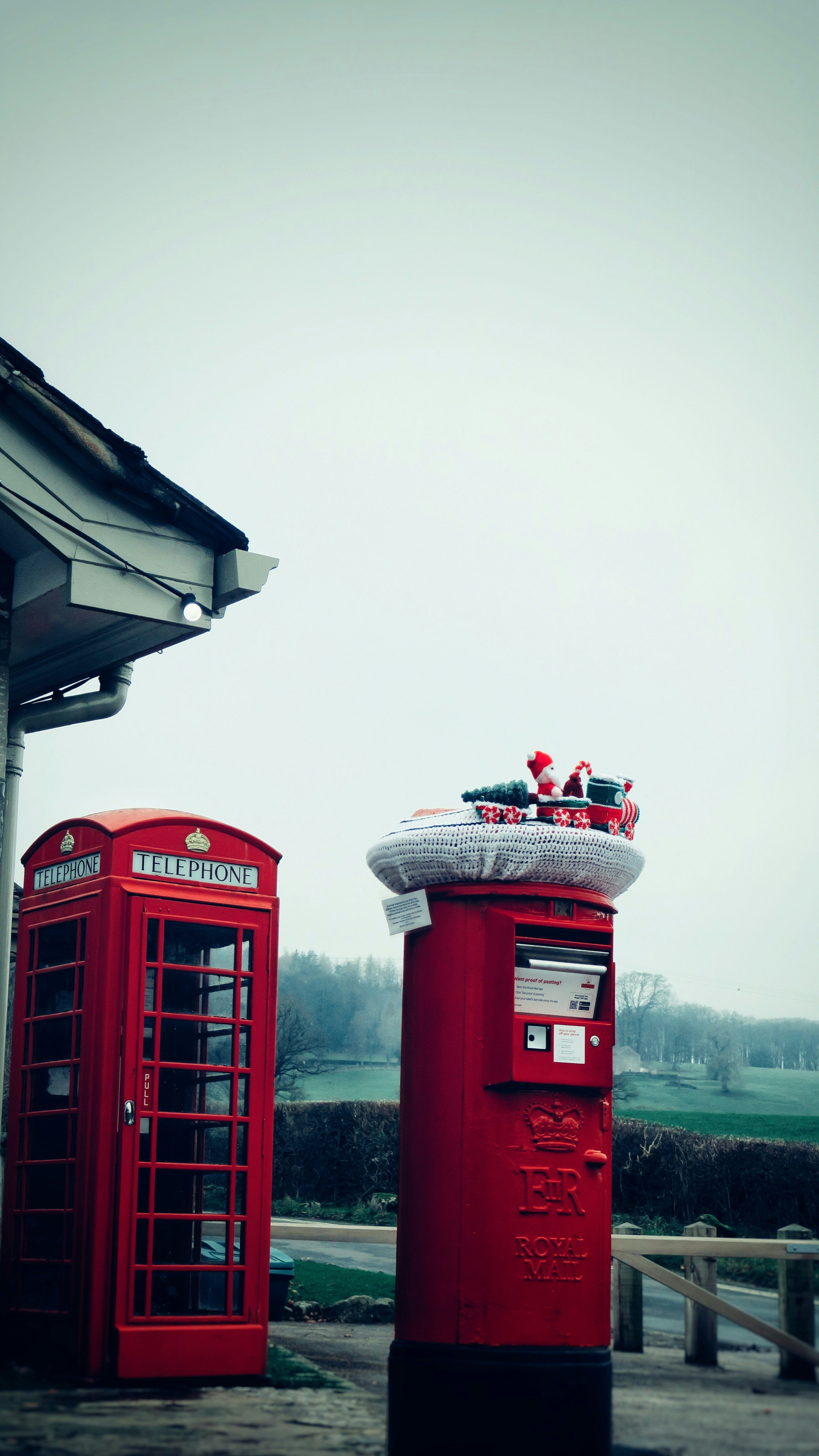 3000x5330 Red british telephone box and post box with decorations