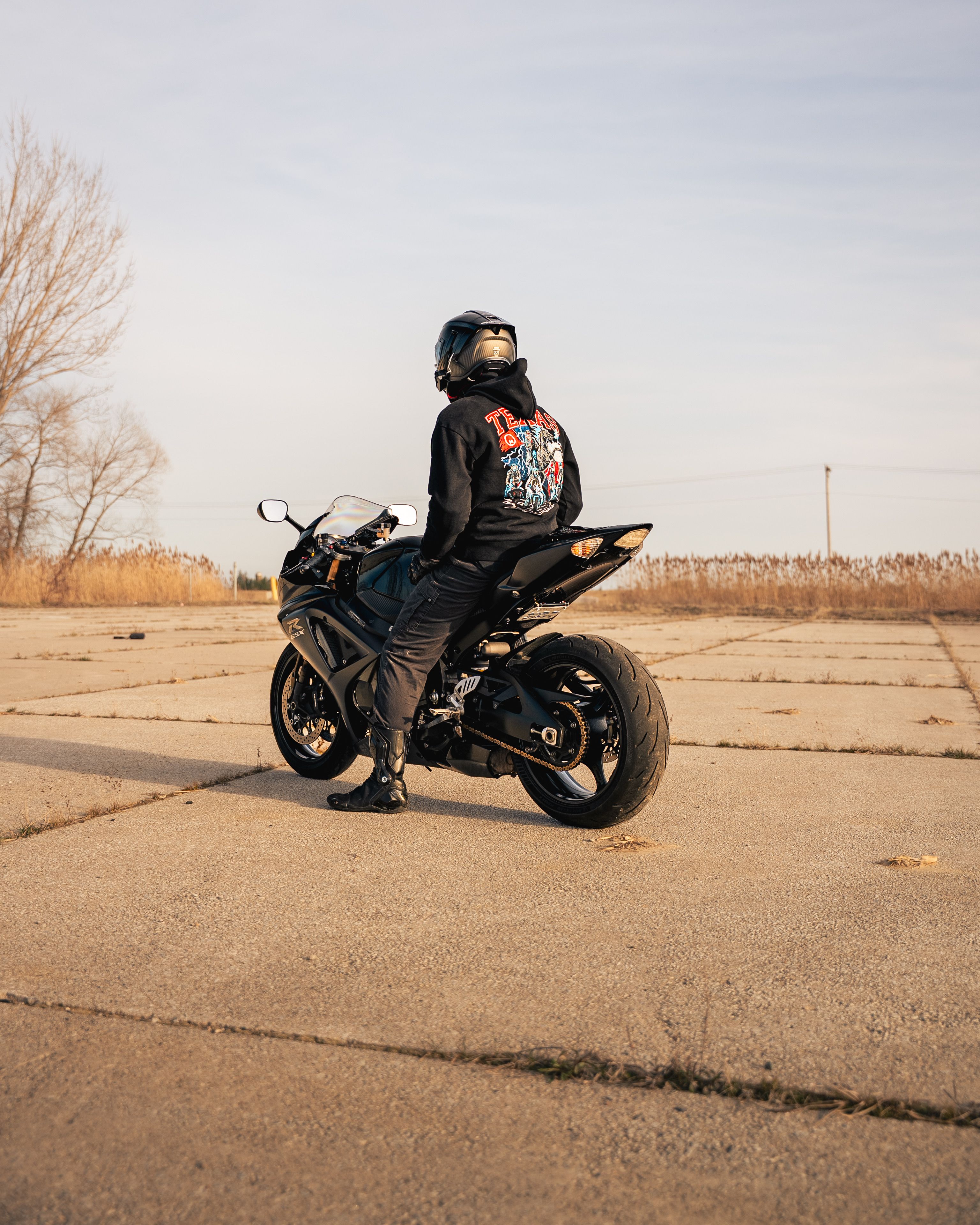 3072x3840 Biker on Sport Motorcycle in Open Area · Free