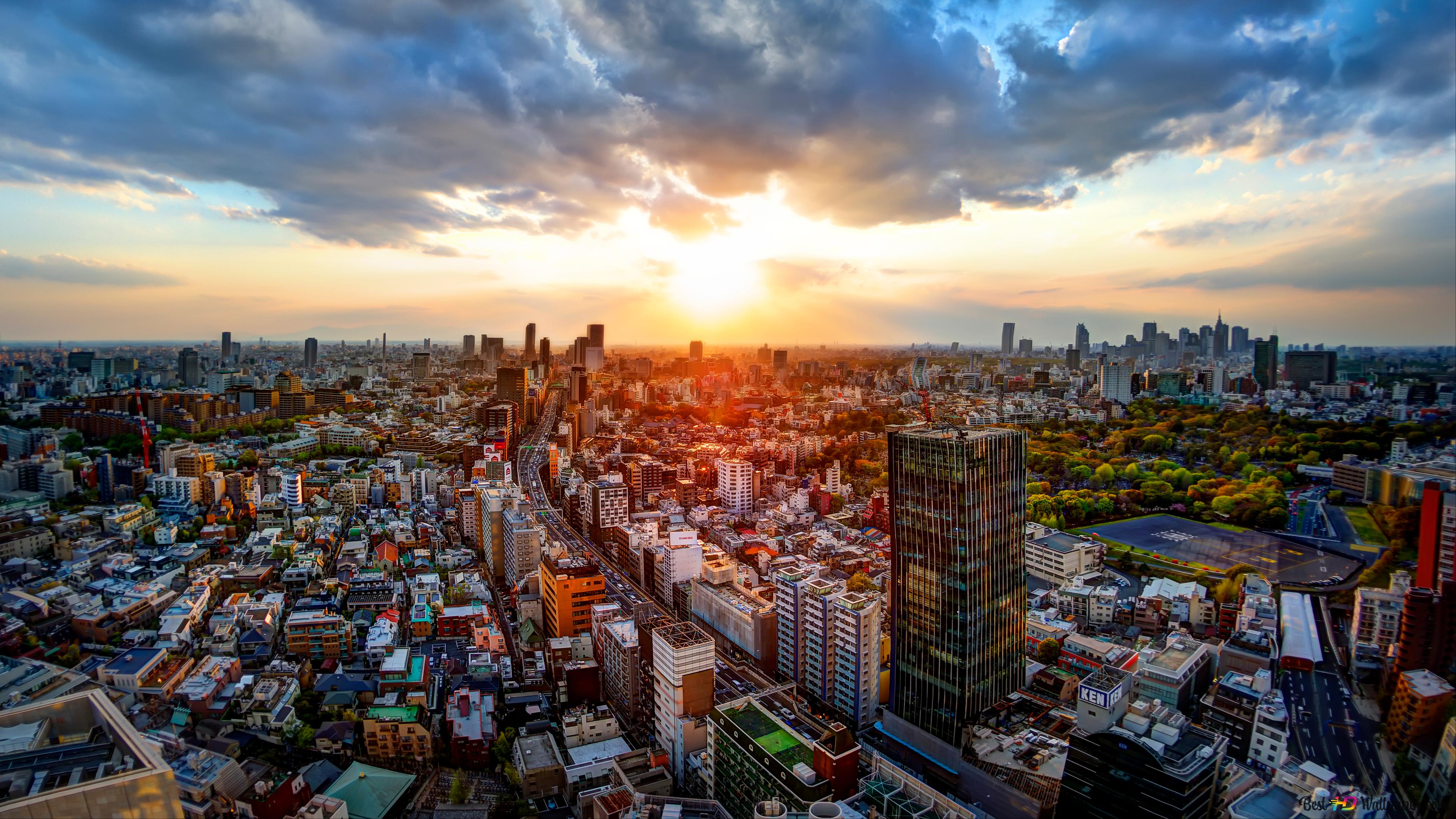 3840x2160 Buildings of tokyo city shot on sunny day 6K wallpaper download