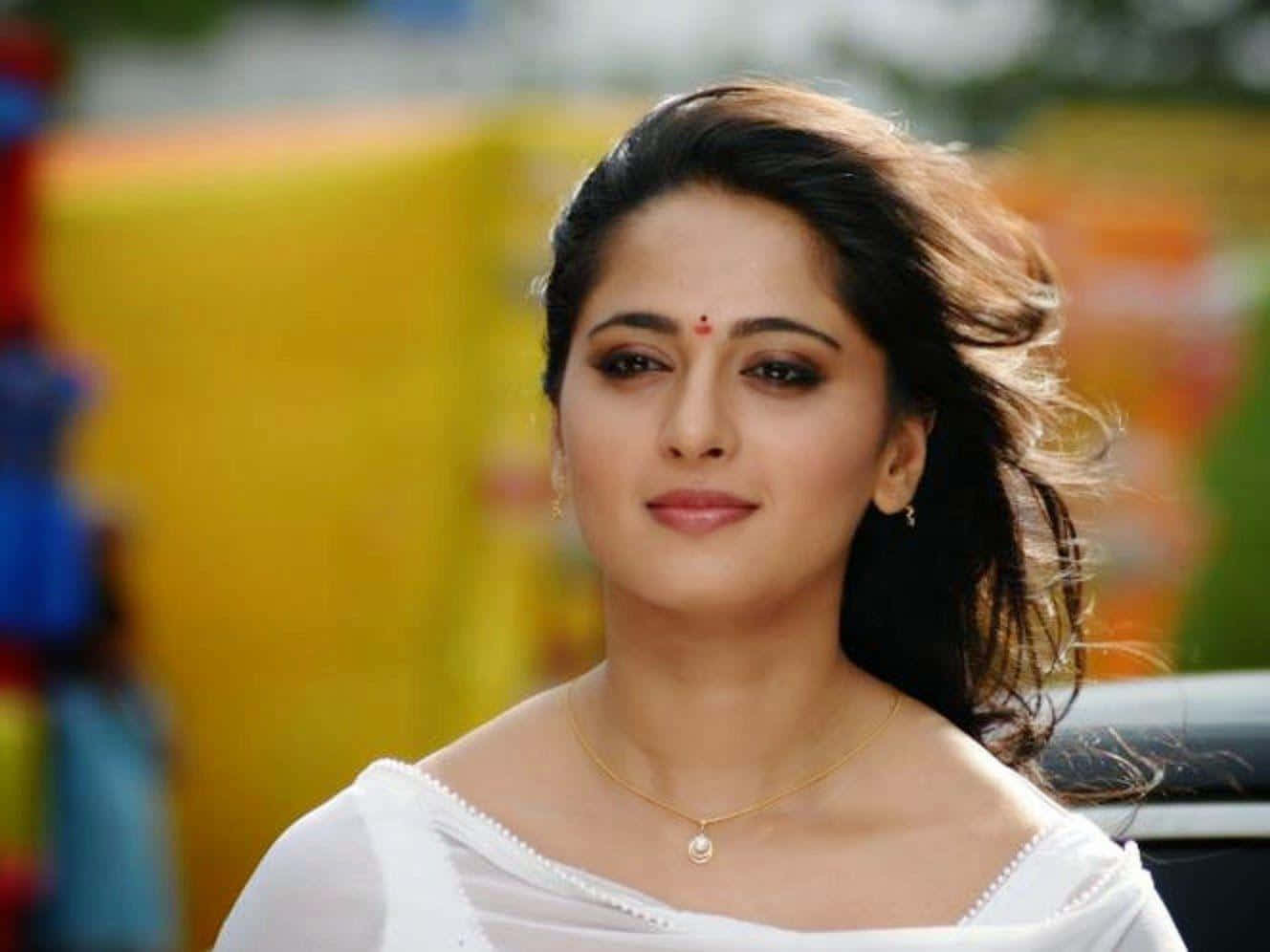 1328x996 Download Elegant White Attire Anushka Shetty Wallpaper