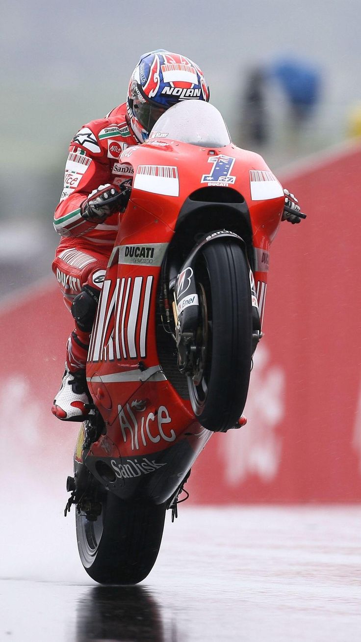 736x1308 Red and blue motorbike. Loris capirossi ducati, Ducati desmosedici gp10 wallpaper, Ducati wallpaper iphone